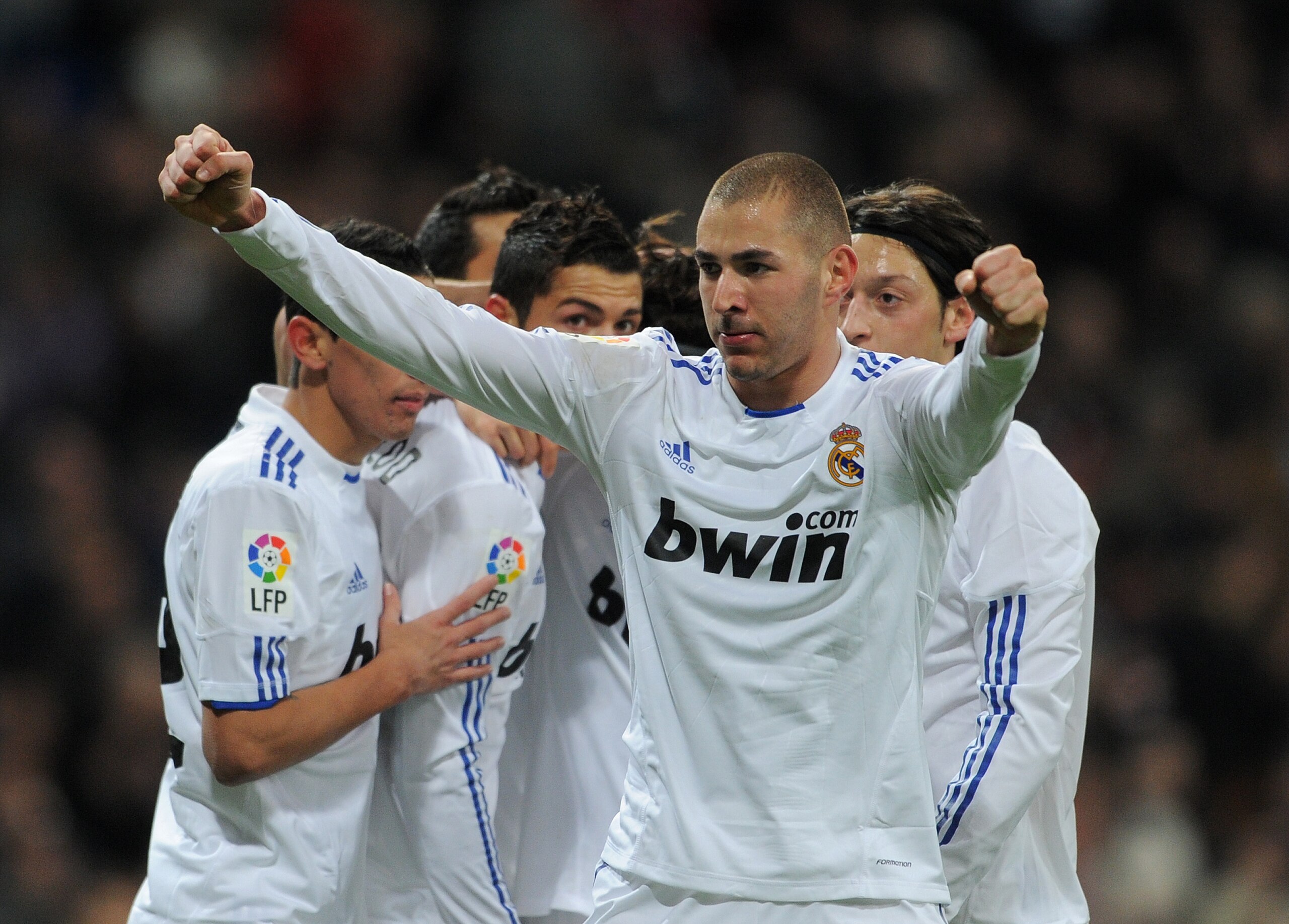 MADRID, SPAIN - JANUARY 23:  Karim Benzema of Real Madrid celebrates scoring his sides opening goal during the la liga match between Real Madrid and Mallorca at Estadio Santiago Bernabeu on January  23, 2011 in Madrid, Spain.  (Photo by Jasper Juinen/Gett