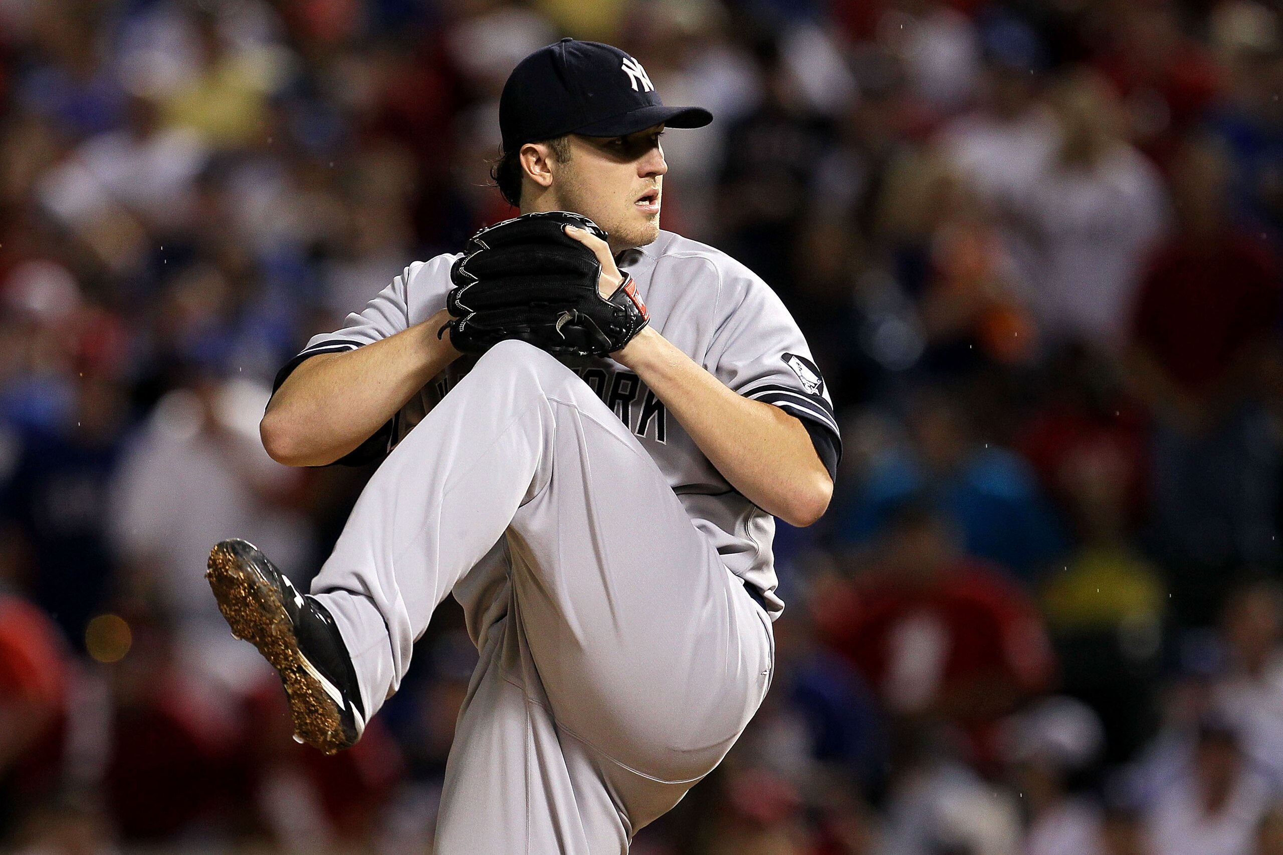 ARLINGTON, TX - OCTOBER 22: Phil Hughes #65 of the New York Yankees throws a pitch against the New York Yankees in Game Six of the ALCS during the 2010 MLB Playoffs at Rangers Ballpark in Arlington on October 22, 2010 in Arlington, Texas. (Photo by Step ARLINGTON, TX - OCTOBER 22: Phil Hughes #65 of the New York Yankees throws a pitch against the New York Yankees in Game Six of the ALCS during the 2010 MLB Playoffs at Rangers Ballpark in Arlington on October 22, 2010 in Arlington, Texas. (Photo by Step