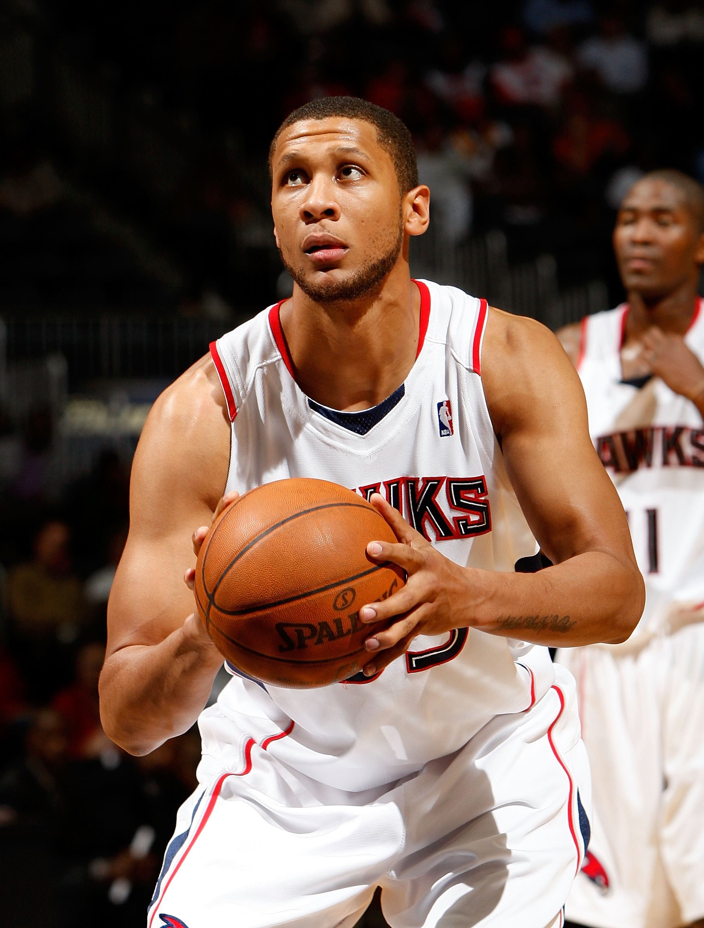 ATLANTA - DECEMBER 02:  Randolph Morris #33 of the Atlanta Hawks against the Toronto Raptors at Philips Arena on December 2, 2009 in Atlanta, Georgia.  NOTE TO USER: User expressly acknowledges and agrees that, by downloading and/or using this Photograph,