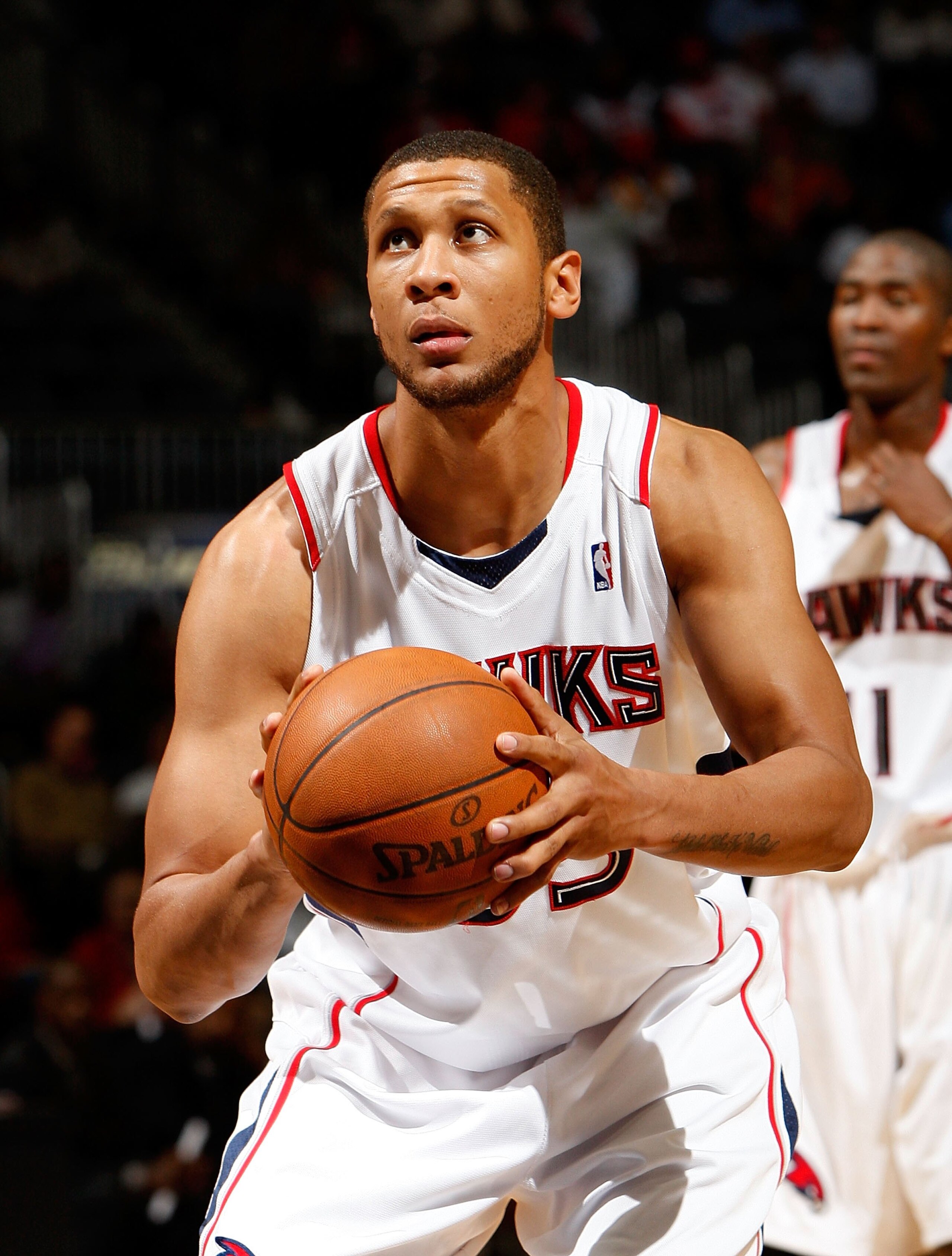 ATLANTA - DECEMBER 02:  Randolph Morris #33 of the Atlanta Hawks against the Toronto Raptors at Philips Arena on December 2, 2009 in Atlanta, Georgia.  NOTE TO USER: User expressly acknowledges and agrees that, by downloading and/or using this Photograph,