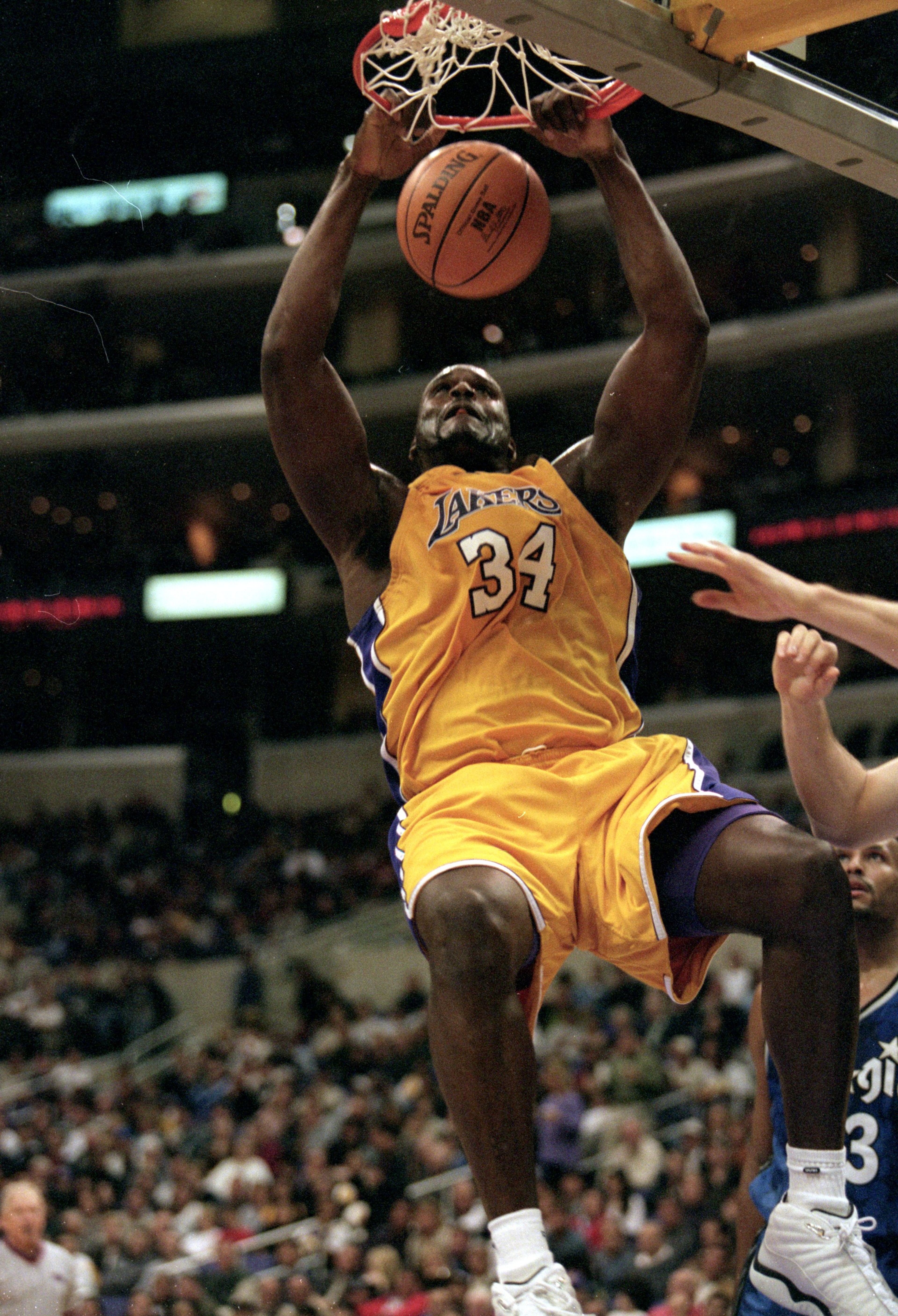 5 Dec 1999: Shaquille O''Neal #34 of the Los Angeles Lakers makes a slam dunk during the game against the Orlando Magic at the Staples Center in Los Angeles, California. The Lakers defeated the Magic 117-100. Mandatory Credit: Kellie Landis /Allsport 5 Dec 1999: Shaquille O''Neal #34 of the Los Angeles Lakers makes a slam dunk during the game against the Orlando Magic at the Staples Center in Los Angeles, California. The Lakers defeated the Magic 117-100. Mandatory Credit: Kellie Landis /Allsport