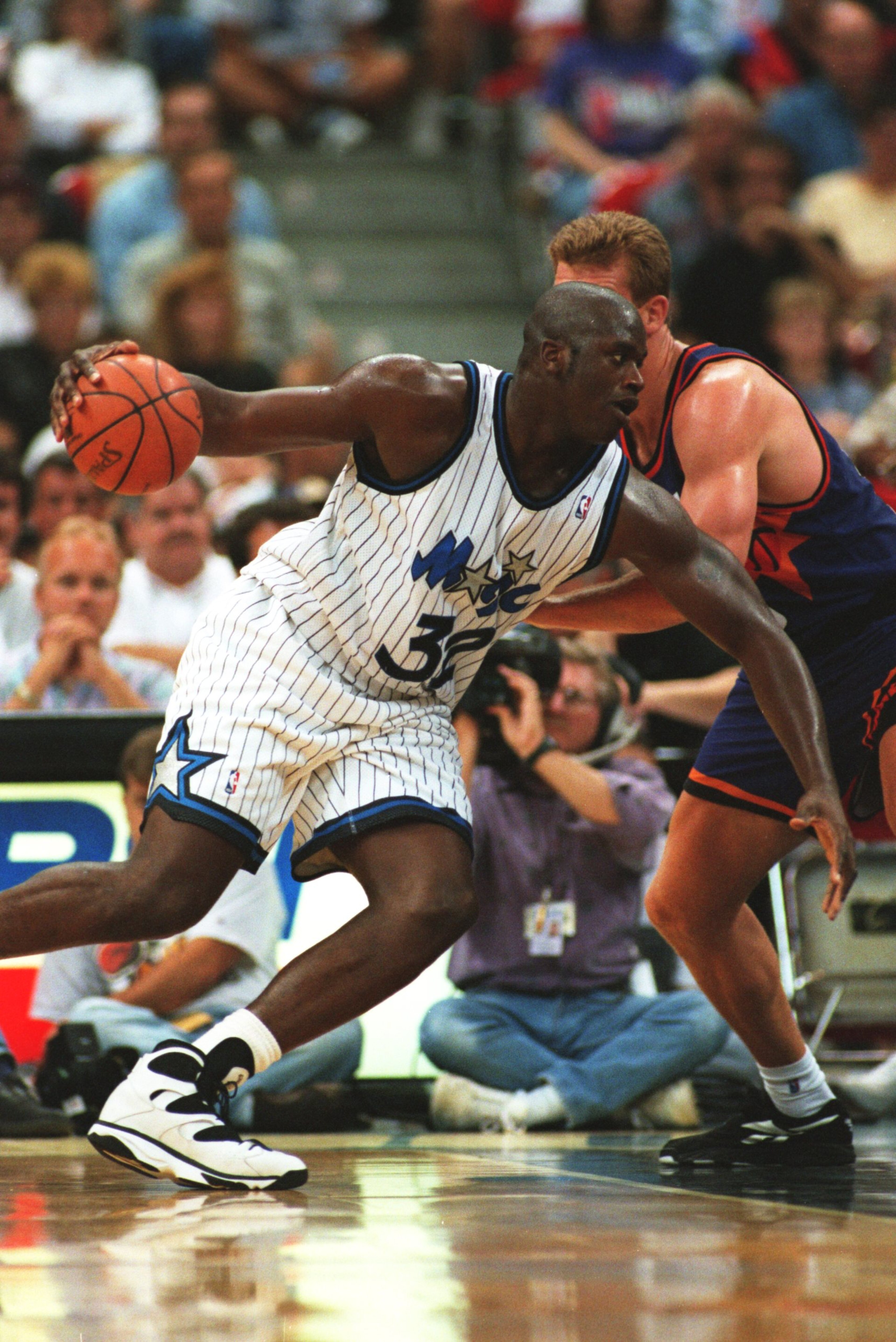 24 Oct 1994: SHAQUILLE O''NEAL OF THE ORLANDO MAGIC ROUNDS A PHOENIX SUNS PLAYER DURING THE SUNS'' 135-129 WIN AT THE ORLANDO ARENA IN FLORIDA. 24 Oct 1994: SHAQUILLE O''NEAL OF THE ORLANDO MAGIC ROUNDS A PHOENIX SUNS PLAYER DURING THE SUNS'' 135-129 WIN AT THE ORLANDO ARENA IN FLORIDA.