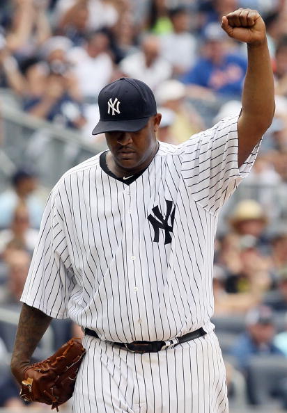 NEW YORK - JUNE 20:  CC Sabathia #52 of the New York Yankees celebrates a seventh inning ending double play against the New York Mets on June 20, 2010 at Yankee Stadium in the Bronx borough of New York City.  (Photo by Jim McIsaac/Getty Images)