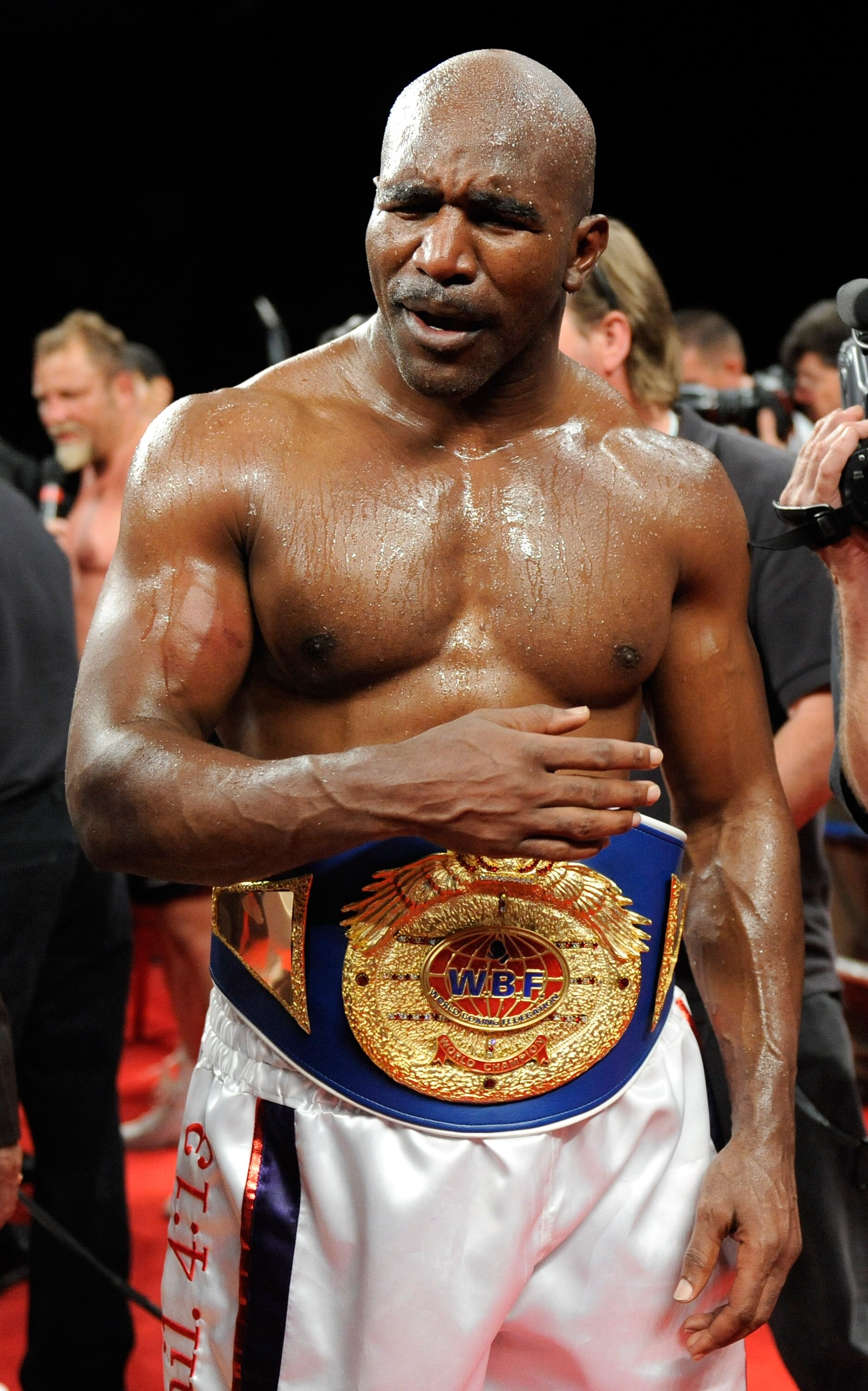 LAS VEGAS - APRIL 10:  Evander Holyfield celebrates his eighth-round TKO victory over Francois Botha in their heavyweight bout at the Thomas & Mack Center April 10, 2010 in Las Vegas, Nevada.  (Photo by Ethan Miller/Getty Images)