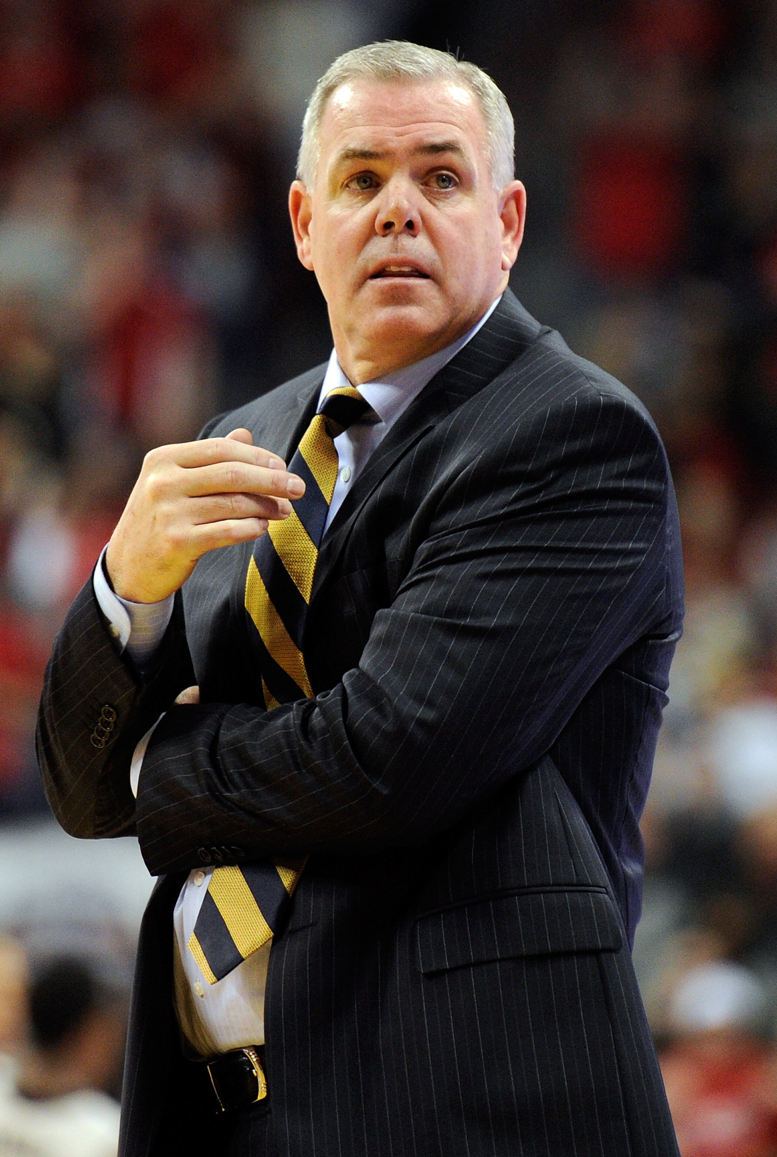 LAS VEGAS, NV - JANUARY 05: Head coach Dave Rose of the Brigham Young University Cougars watches his players during their game against the UNLV Rebels at the Thomas & Mack Center January 5, 2011 in Las Vegas, Nevada. BYU won 89-77. (Photo by Ethan Mille LAS VEGAS, NV - JANUARY 05: Head coach Dave Rose of the Brigham Young University Cougars watches his players during their game against the UNLV Rebels at the Thomas & Mack Center January 5, 2011 in Las Vegas, Nevada. BYU won 89-77. (Photo by Ethan Mille