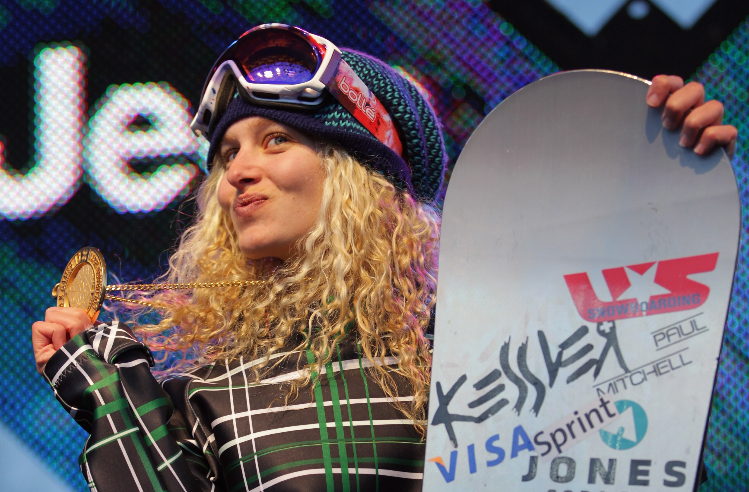 ASPEN, CO - JANUARY 29:  Lindsey Jacobellis of the USA takes the podium after winning the gold medal in the Women's Snowboarder X at Winter X Games 15 at Buttermilk Mountain on January 29, 2011 in Aspen, Colorado.  (Photo by Doug Pensinger/Getty Images)