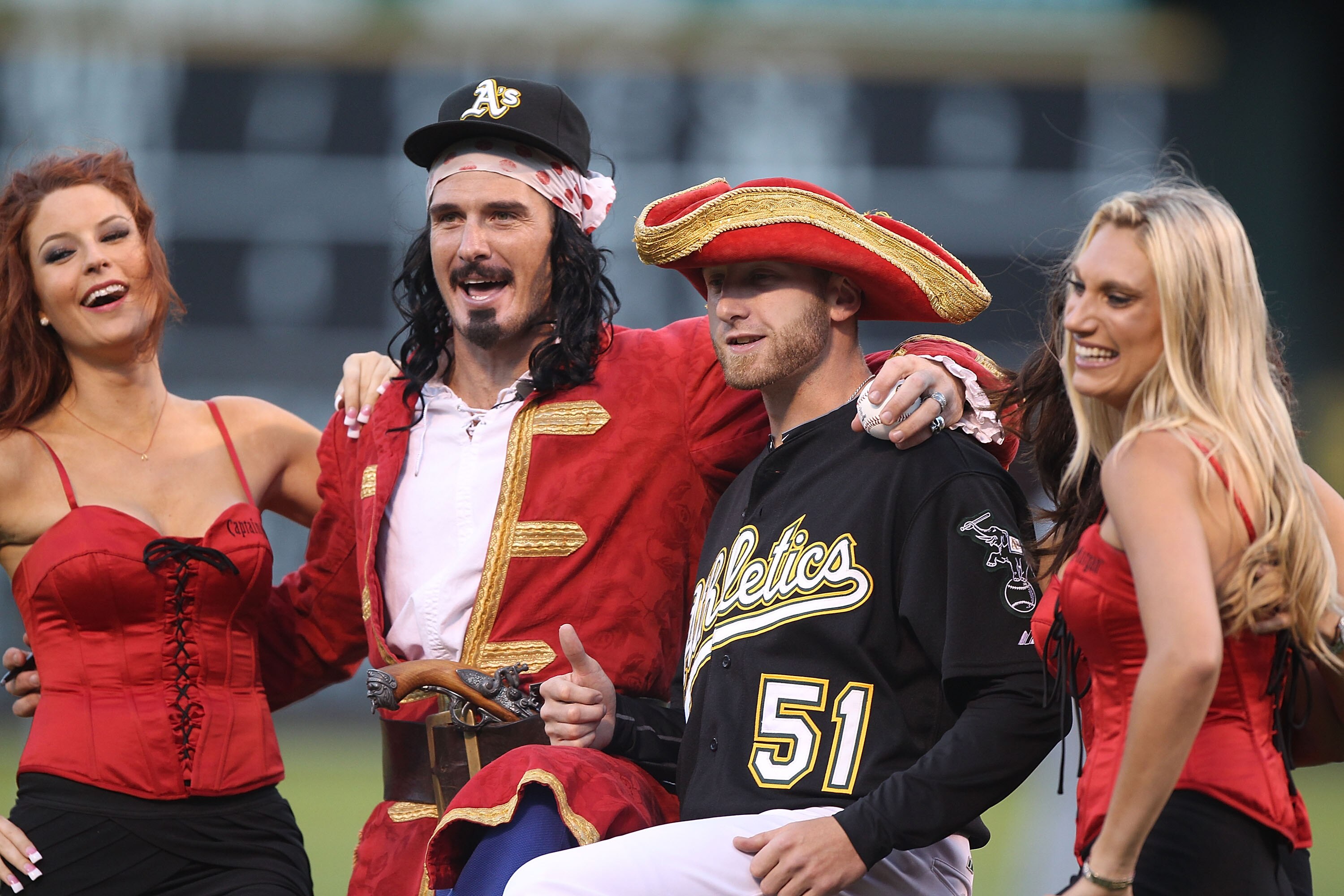 OAKLAND, CA - SEPTEMBER 8: Dallas Braden #51 of the Oakland Athletics poses with Captain Morgan before their game against the Seattle Mariners during a Major League Baseball game at the Oakland-Alameda County Coliseum on September 8, 2010 in Oakland, Cali