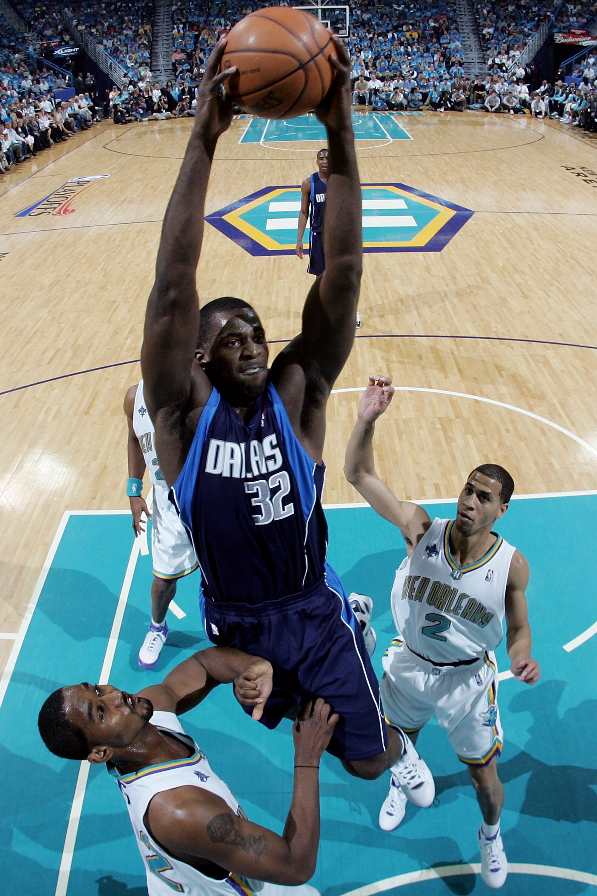 NEW ORLEANS - APRIL 19:  Brandon Bass #32 of the Dallas Mavericks dunks the ball over  the New Orleans Hornets in Game One of the Western Conference Quarterfinals during the 2008 NBA Playoffs at The New Orleans Arena on April 19, 2008 in New Orleans, Loui