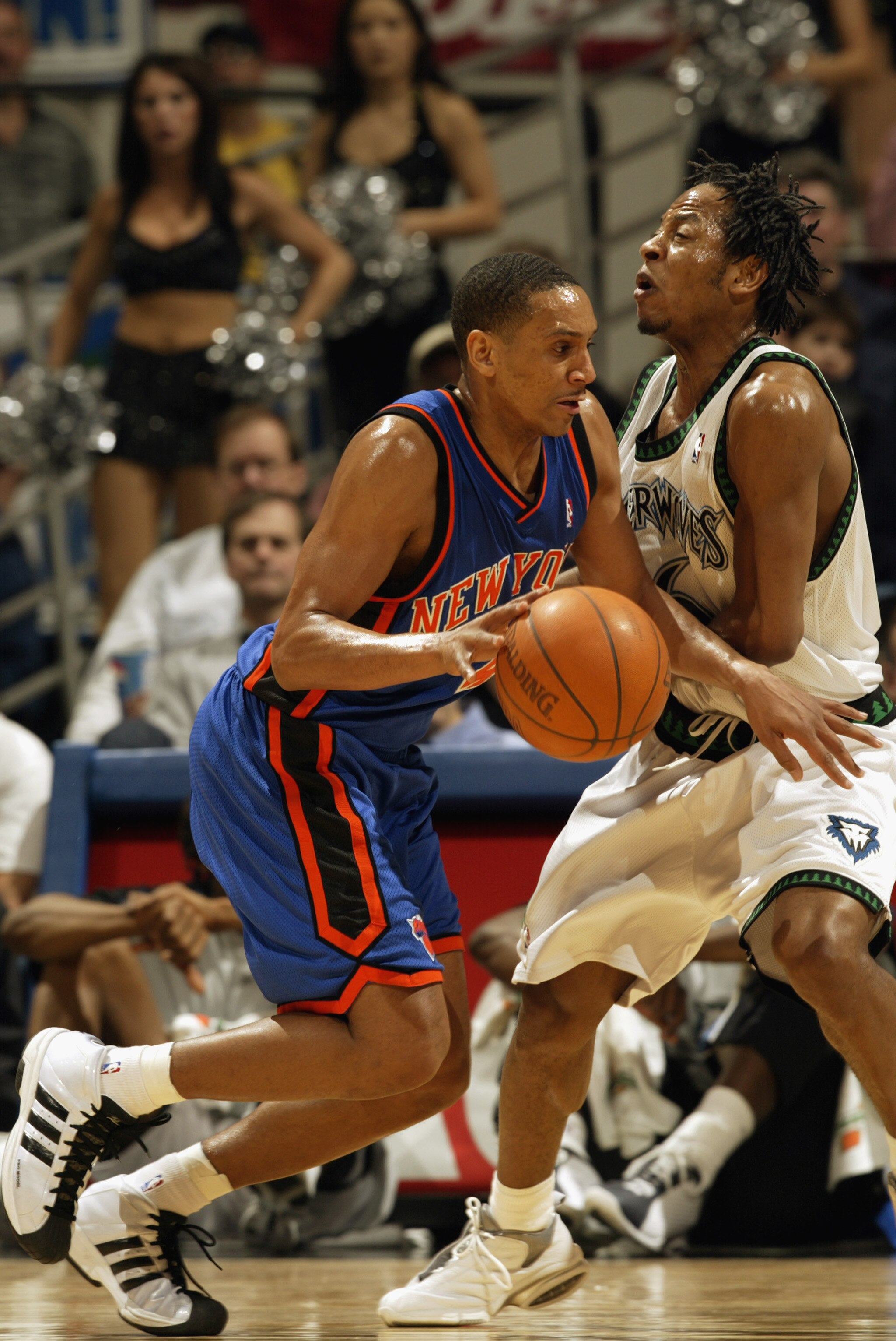MINNEAPOLIS - MARCH 2:  Howard Eisley #4 of the New York Knicks drives against Troy Hudson #16 of the Minnesota Timberwolves during the game at Target Center on March 2, 2003 in Minneapolis, Minnesota.  The Timberwolves won 99-90.  NOTE TO USER: User expr