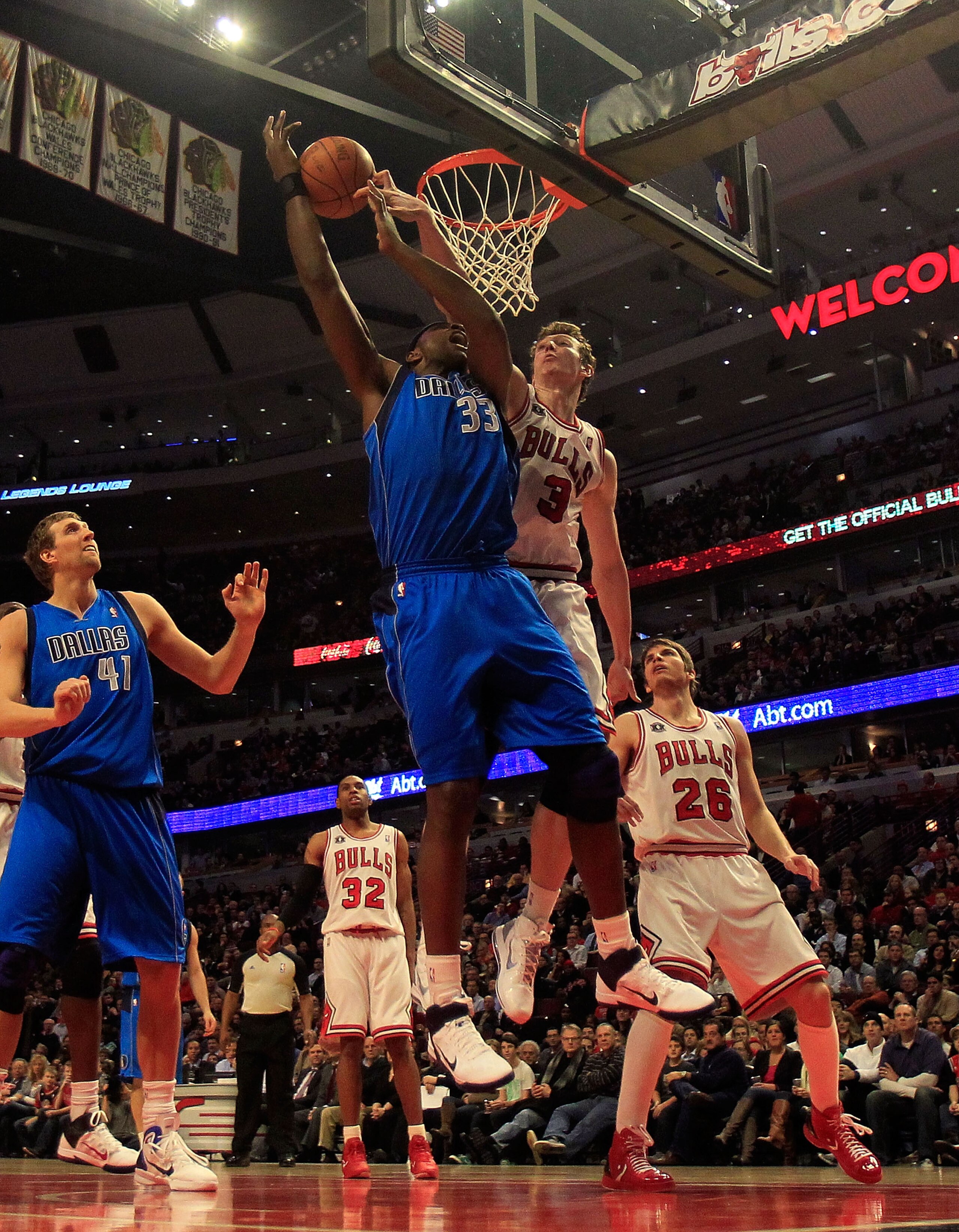 CHICAGO, IL - JANUARY 20: Omer Asik #3 of the Chicago Bulls blocks a shot by Brendan Haywood #33 of the Dallas Mavericks at the United Center on January 20, 2011 in Chicago, Illinois. The Bulls defeated the Mavericks 82-77. NOTE TO USER: User expressly ac