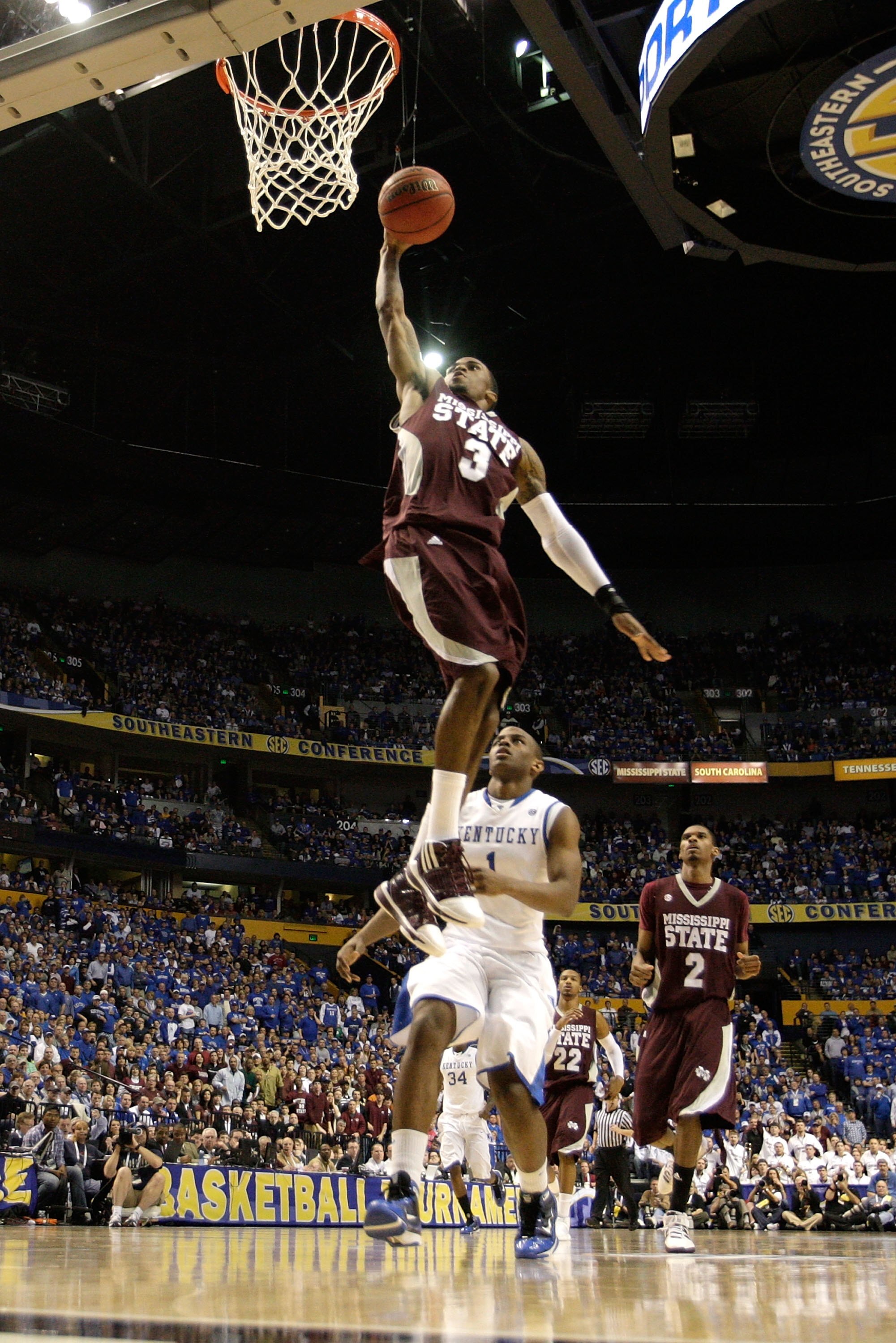 NASHVILLE, TN - MARCH 14:  Dee Bost #3 of the Mississippi State Bulldogs dunks against the Kentucky Wildcats during the final of the SEC Men's Basketball Tournament at the Bridgestone Arena on March 14, 2010 in Nashville, Tennessee. Kentucky won 75-74 in