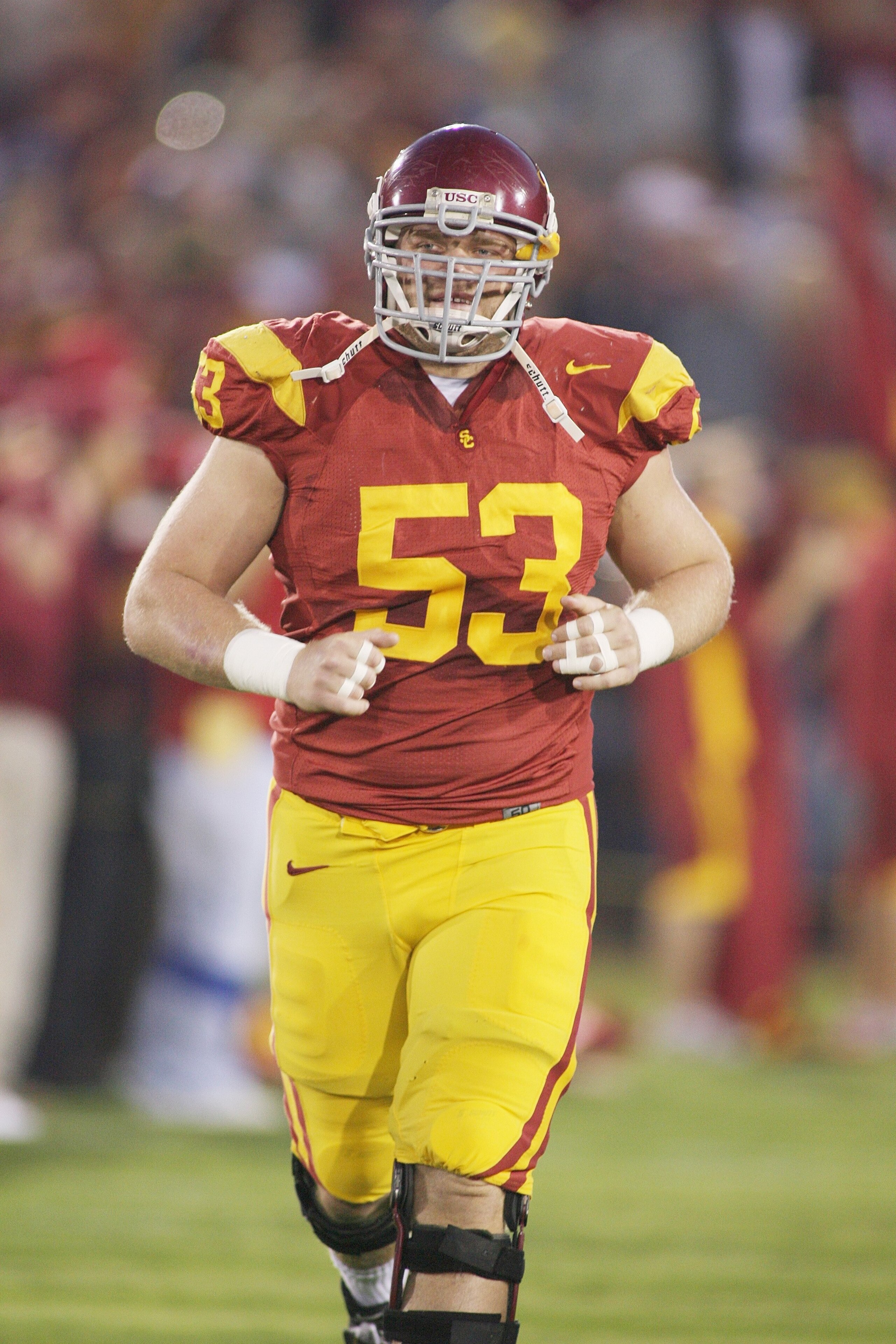 LOS ANGELES - NOVEMBER 29:  Jeff Byers #53 of the USC Trojans takes the field during senior introductions before the game against the Notre Dame Fighting Irish on November 29, 2008 at the Los Angeles Memorial Coliseum in Los Angeles, California.  USC won