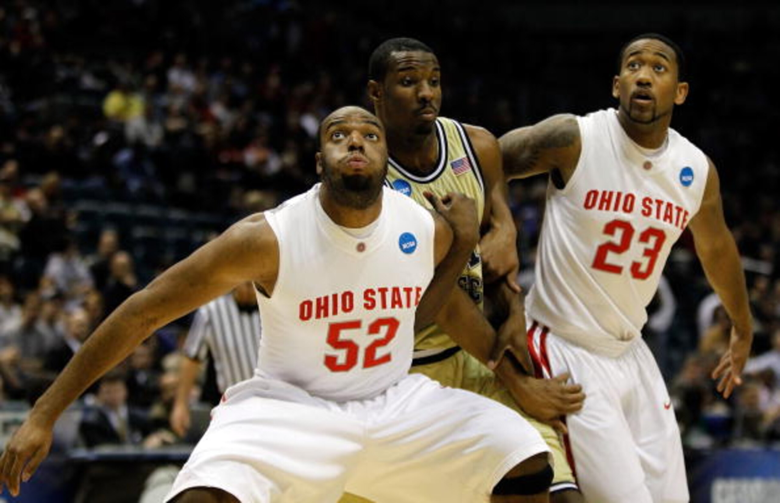 MILWAUKEE - MARCH 21: Dallas Lauderdale #52 and David Lighty #23 of the Ohio State Buckeyes box out Gani Lawal #31 of the Georgia Tech Yellow Jackets during the second round of the 2010 NCAA men's basketball tournament at the Bradley Center on March 21, MILWAUKEE - MARCH 21: Dallas Lauderdale #52 and David Lighty #23 of the Ohio State Buckeyes box out Gani Lawal #31 of the Georgia Tech Yellow Jackets during the second round of the 2010 NCAA men's basketball tournament at the Bradley Center on March 21,