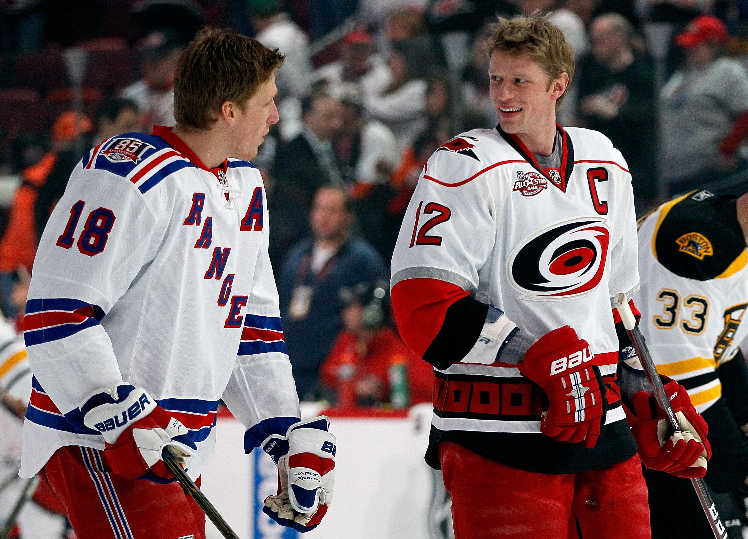 RALEIGH, NC - JANUARY 29:  Marc Staal #18 of the New York Rangers and Eric Staal #12 of the Carolina Hurricanes skate on the ice before the Honda NHL SuperSkills competition part of 2011 NHL All-Star Weekend at the RBC Center on January 29, 2011 in Raleig
