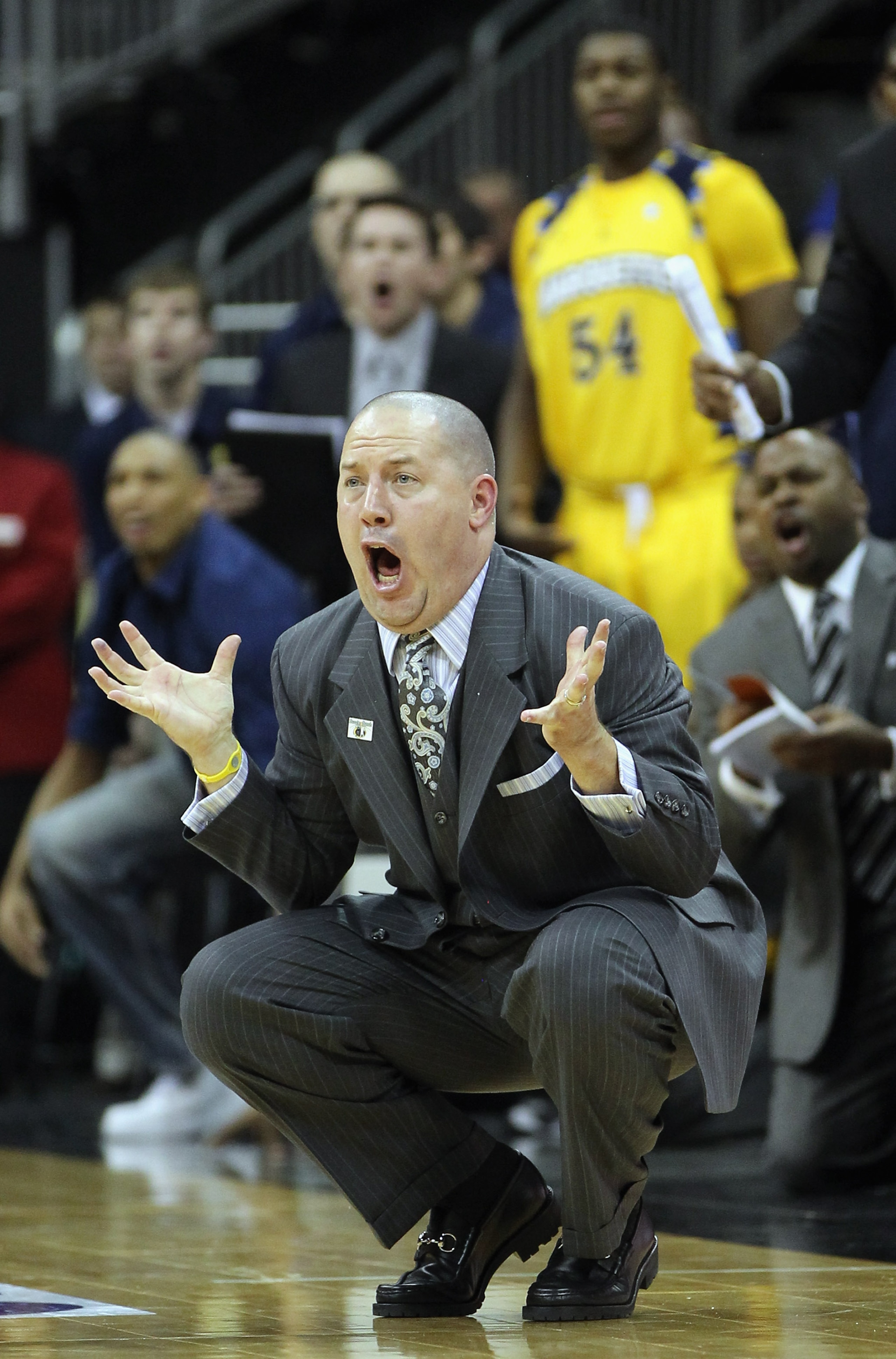 KANSAS CITY, MO - NOVEMBER 23:  Head coach Buzz Williams of the Marquette Golden Eagles reacts to a call during the CBE Classic consolation game against the Gonzaga Bulldogs on November 23, 2010 at the Sprint Center in Kansas City, Missouri.  (Photo by Ja