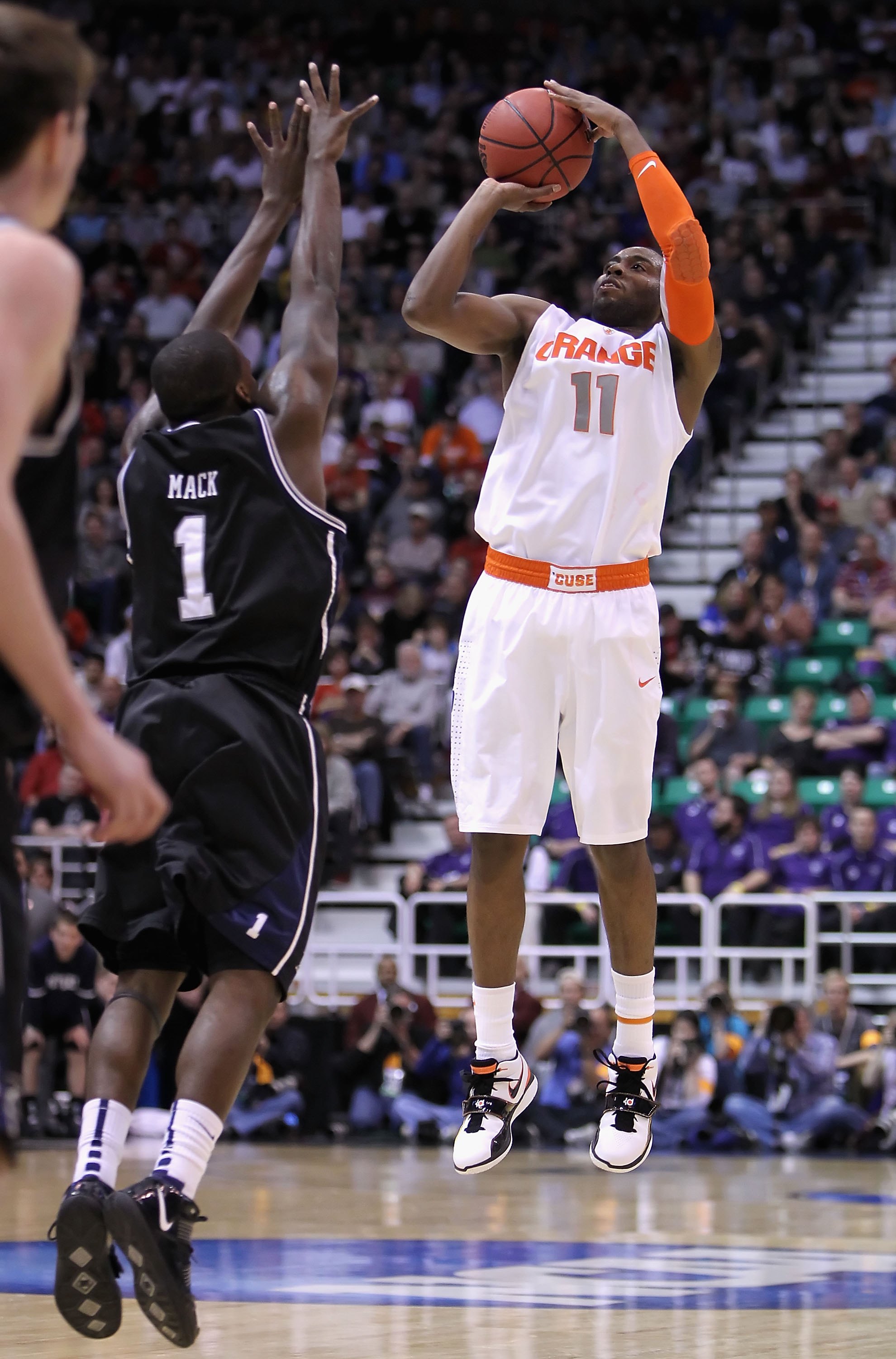 SALT LAKE CITY - MARCH 25:  Scoop Jardine #11 of the Syracuse Orange puts up a shot against the Butler Bulldogs during the west regional semifinal of the 2010 NCAA men's basketball tournament at the Energy Solutions Arena on March 25, 2010 in Salt Lake Ci
