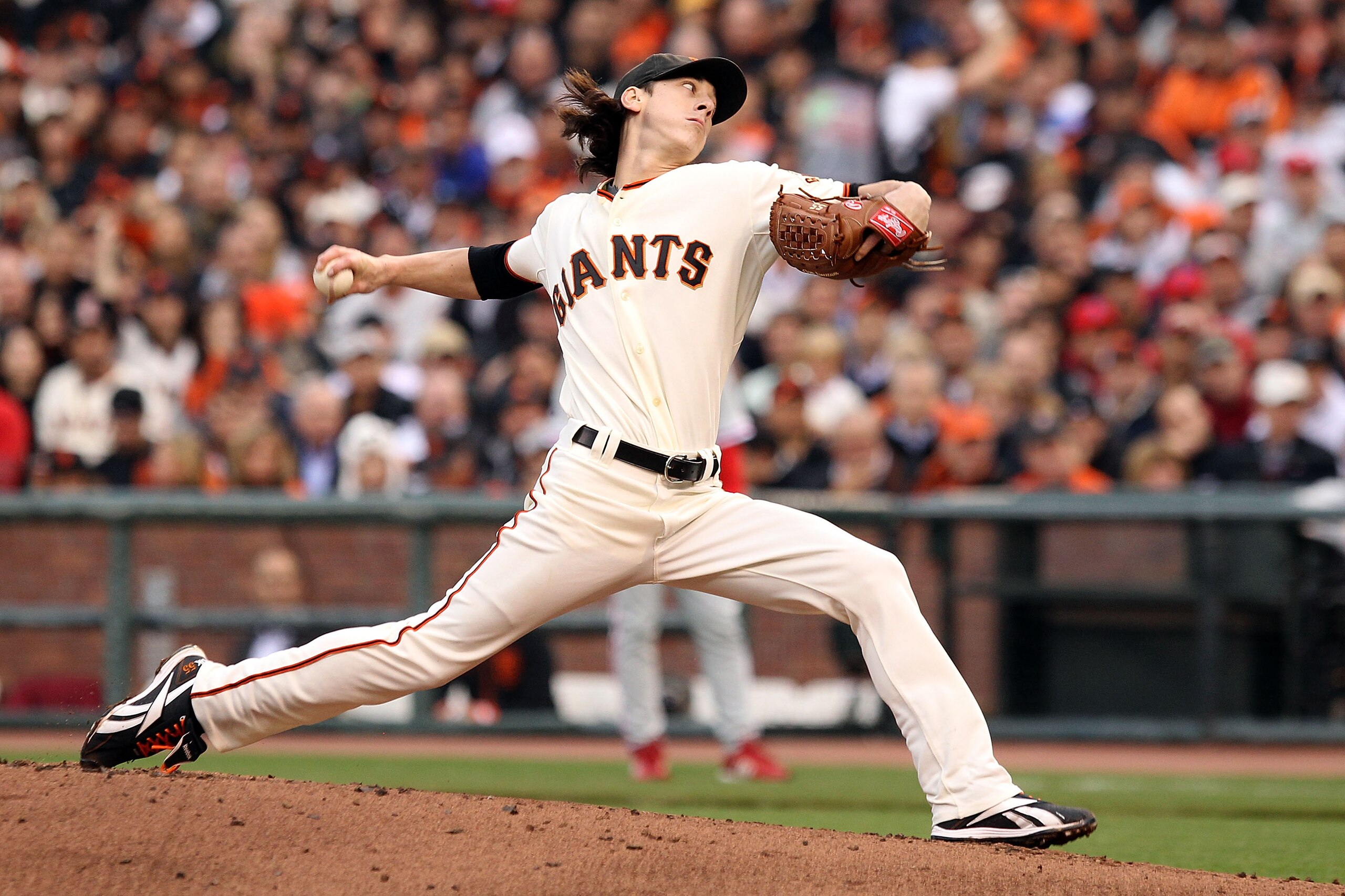 SAN FRANCISCO - OCTOBER 21:  Tim Lincecum #55 of the San Francisco Giants throws a pitch against the Philadelphia Phillies in the second inning of Game Five of the NLCS during the 2010 MLB Playoffs at AT&T Park on October 21, 2010 in San Francisco, Califo