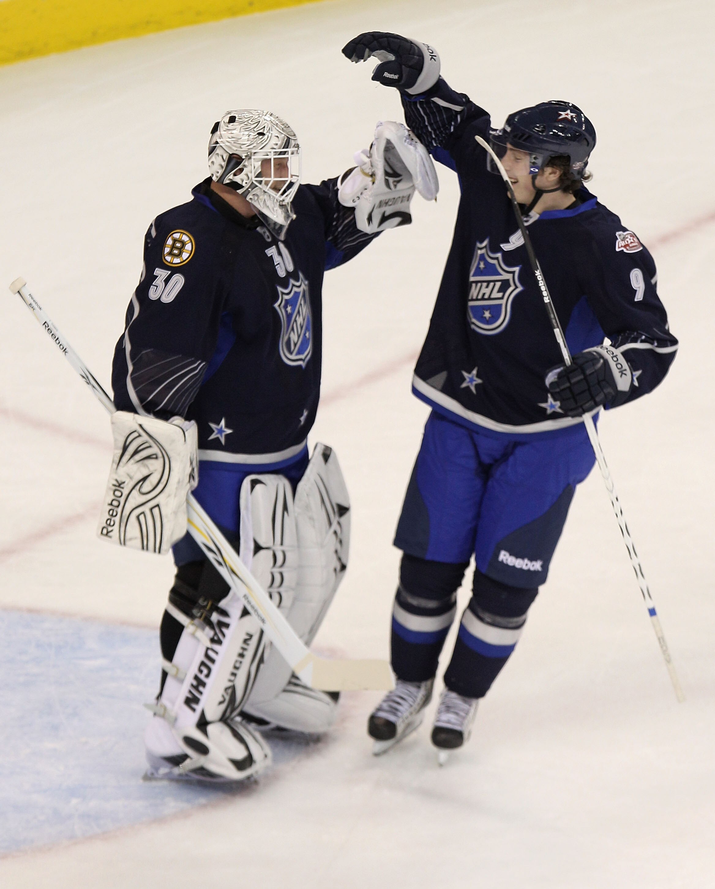 RALEIGH, NC - JANUARY 30:  Team Lidstrom players Tim Thomas #30 of the Boston Bruins and Matt Duchene #9 of the Colorado Avalanche celebrate after the defeated Team Staal 11 to 10 in the 58th NHL All-Star Game at RBC Center on January 30, 2011 in Raleigh,
