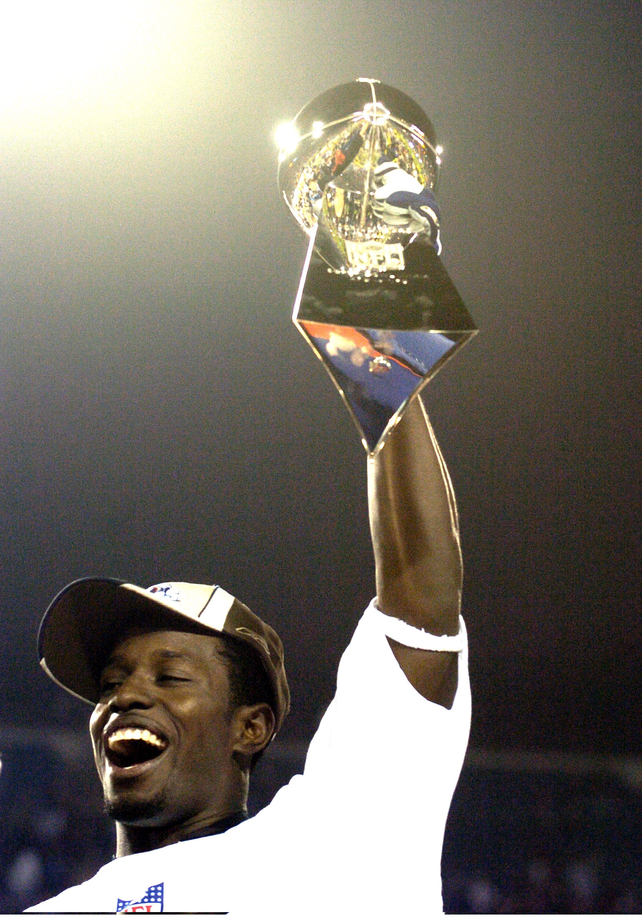 Super Bowl XXXIX Most Valuable Player Deion Branch holds up The Vince Lombardi Trophy  The New England Patriots defeated The Philadelphia Eagles in Super Bowl XXXIX at Alltel Staduim in Jacksonville, Florida.  (Photo by Al Messerschmidt/Getty Images)
