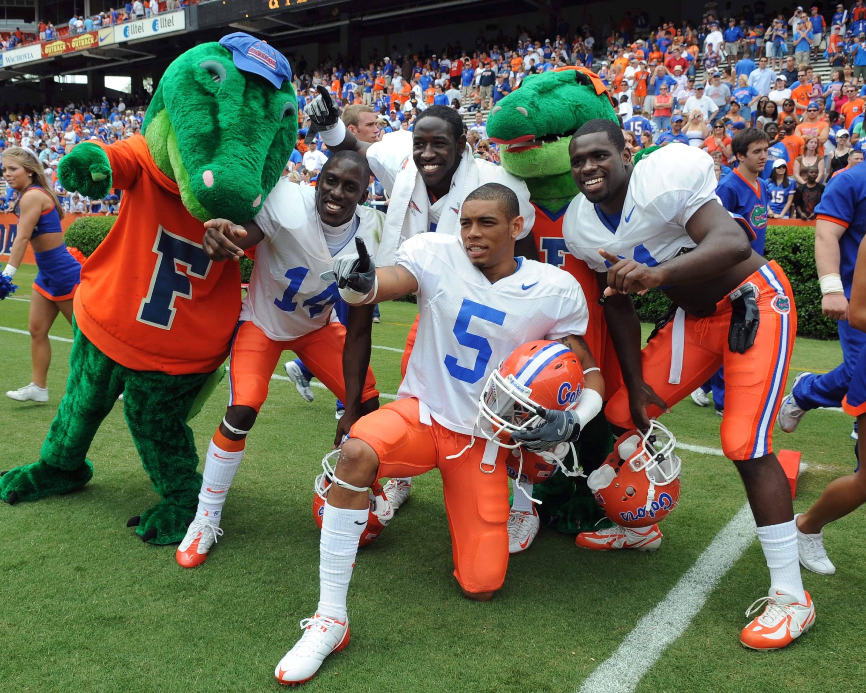 GAINESVILLE, FL - APRIL 18: Cornerback Joe Haden #5 of the University of Florida poses with two Gator mascots after the spring football orange and blue game April 18, 2009 at Ben Hill Griffin Stadium in Gainesville, Florida.  (Photo by Al Messerschmidt/Ge