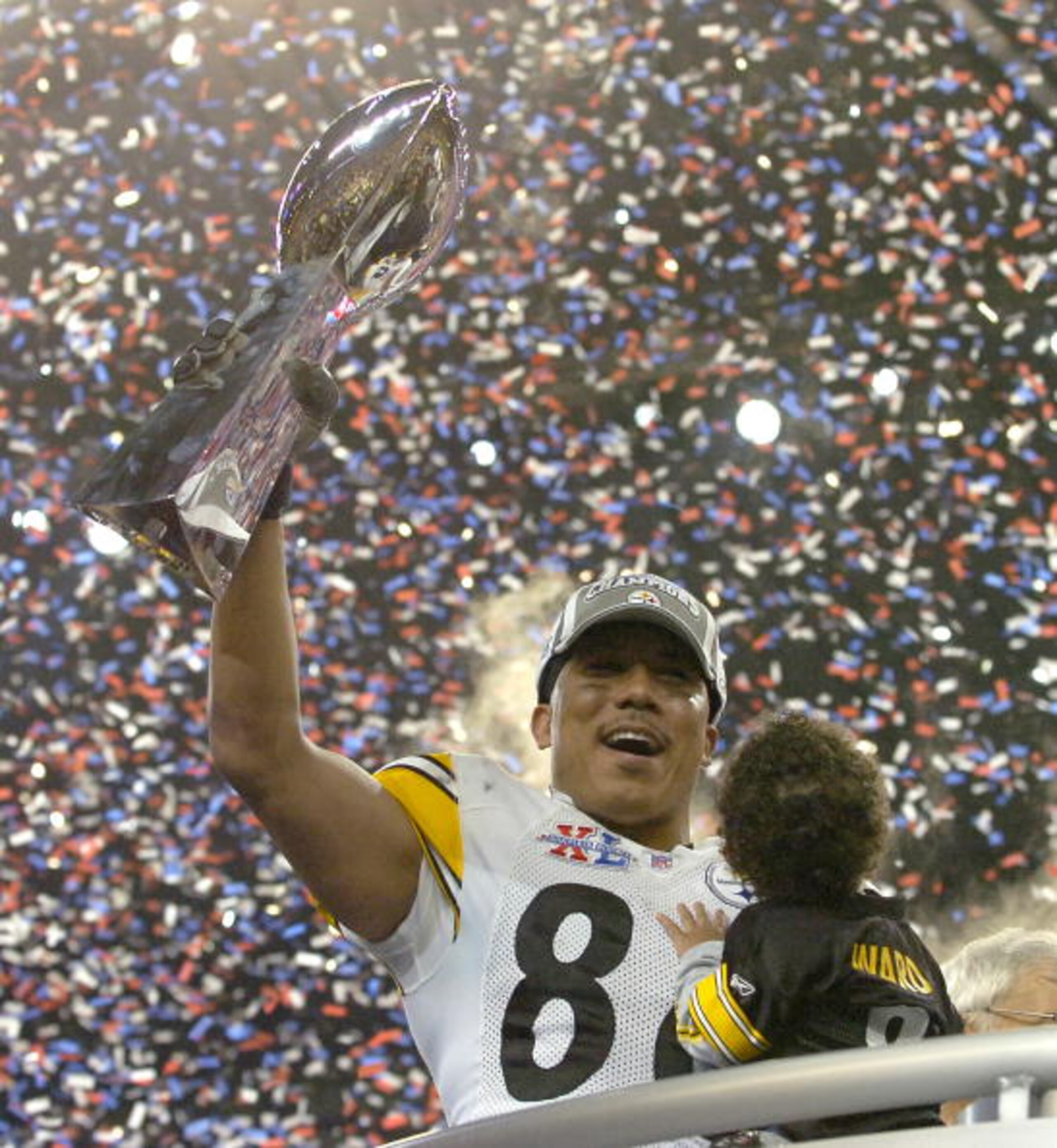 Steelers Hines Ward, who won the MVP, holds the Vince Lombardi trophy after the Steelers won Super Bowl XL between the Pittsburgh Steelers and Seattle Seahawks at Ford Field in Detroit, Michigan on February 5, 2006.  (Photo by Al Messerschmidt/Getty Image