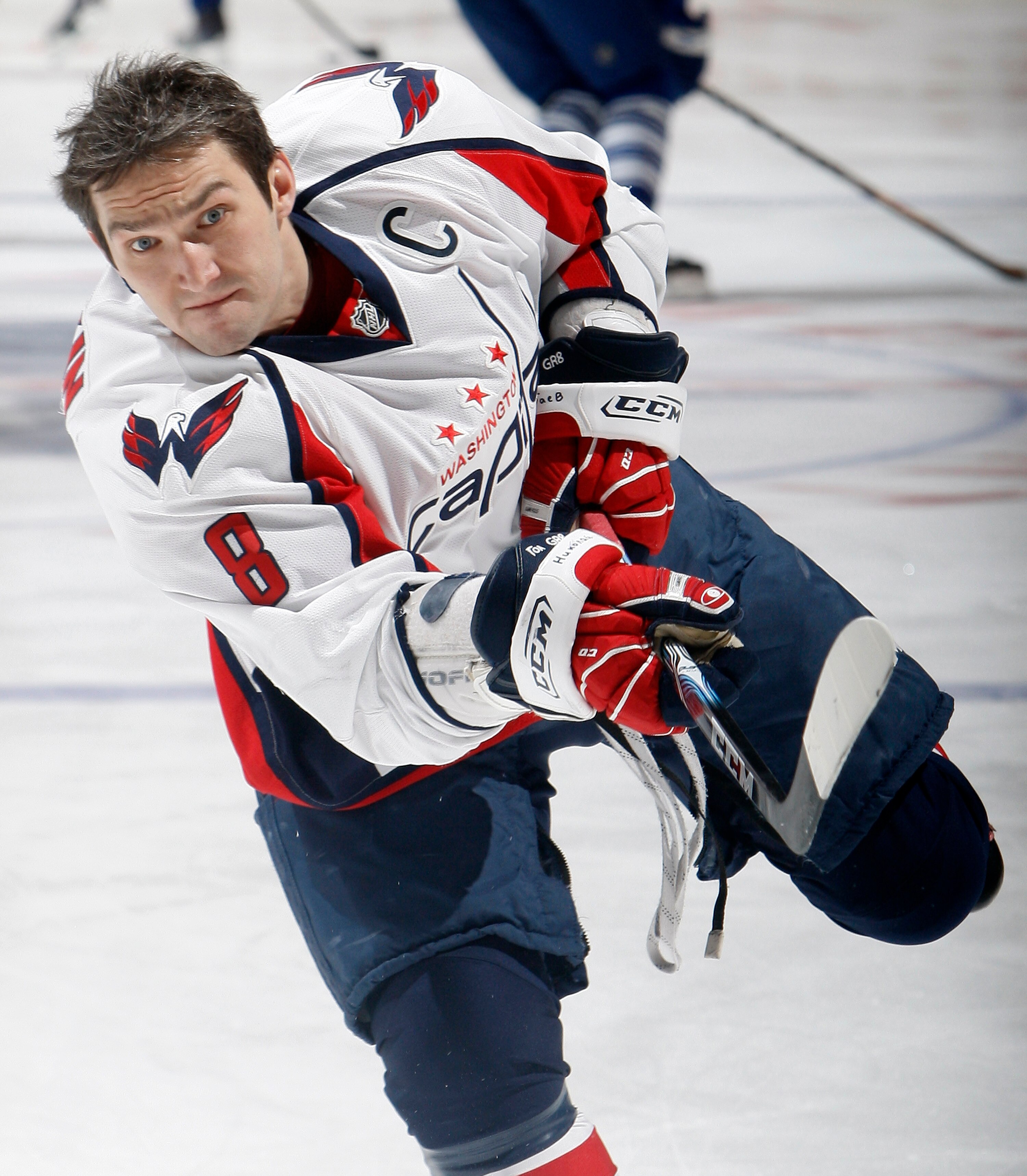 TORONTO, CANADA - JANUARY 22:  Alex Ovechkin #8 of the Washington Capitals shoots during warmup before game action at the Air Canada Centre January 22, 2011 in Toronto, Ontario, Canada. (Photo by Abelimages/Getty Images)