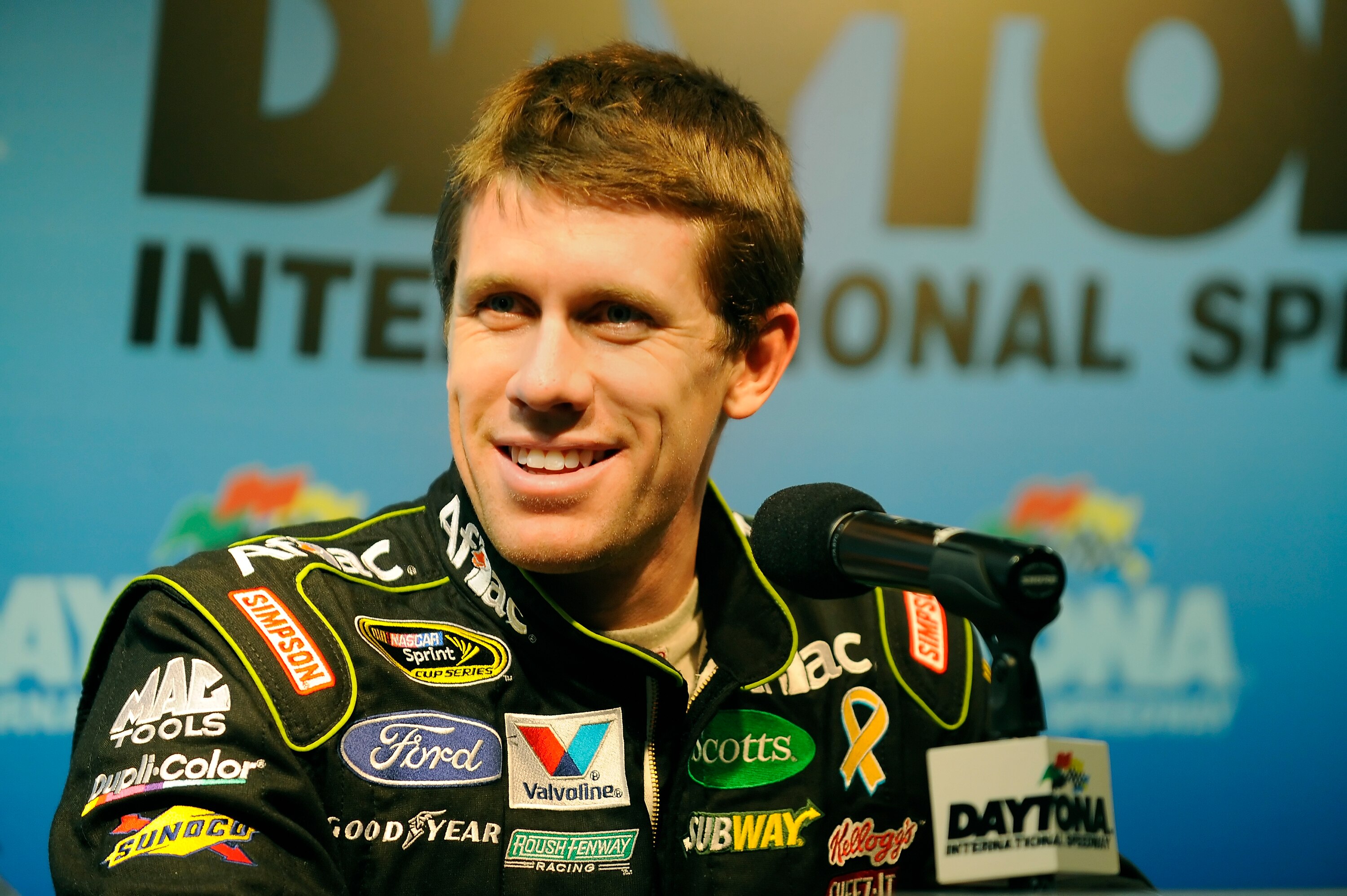 DAYTONA BEACH, FL - JANUARY 20:  Carl Edwards, driver of the #99 Aflac Ford, speaks to the media during the break from testing at Daytona International Speedway on January 20, 2011 in Daytona Beach, Florida.  (Photo by Jared C. Tilton/Getty Images for NAS