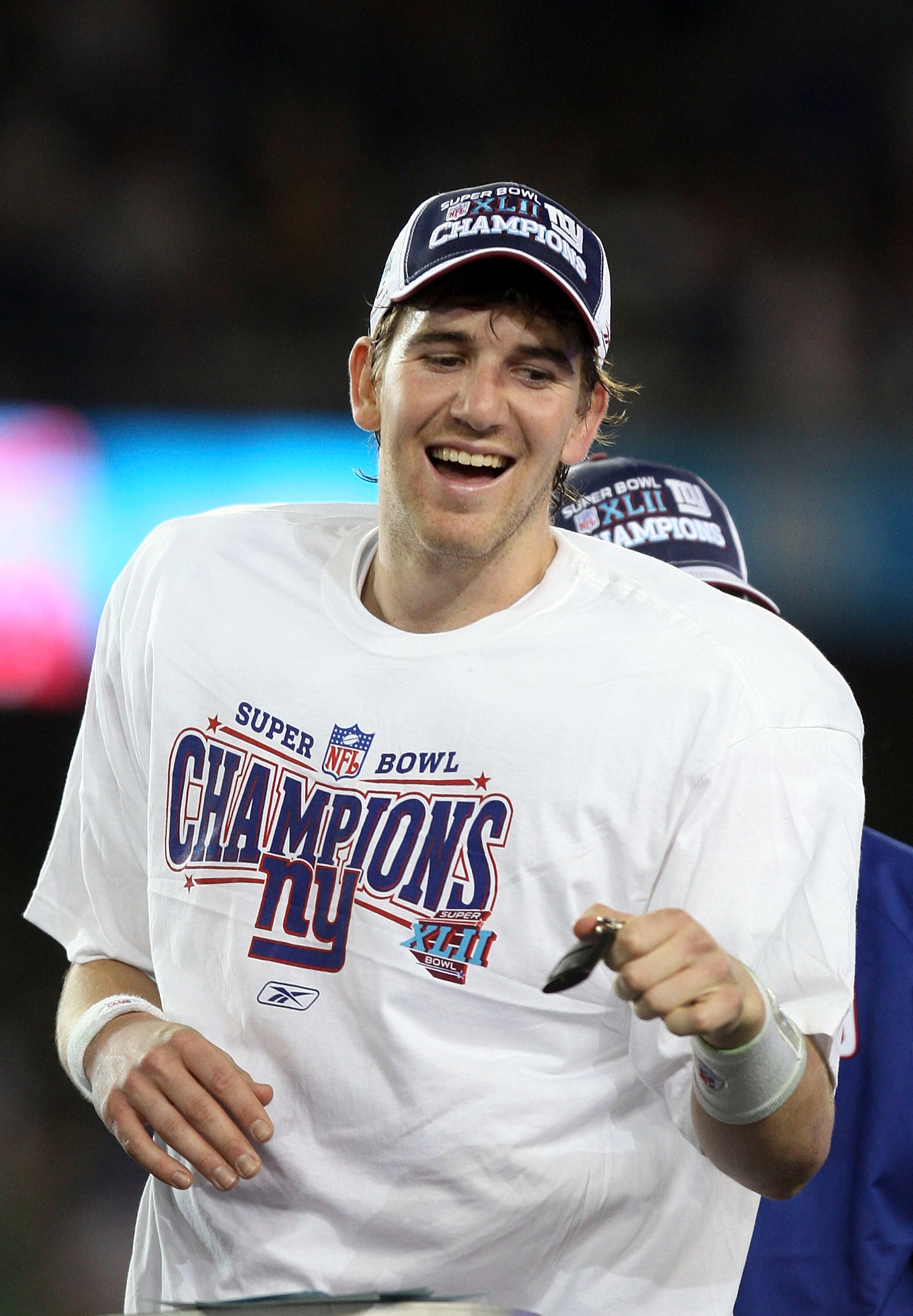 GLENDALE, AZ - FEBRUARY 03:  Quarterback Eli Manning #10 of the New York Giants reacts after the Giants defeated the New England Patriots 17-14 during Super Bowl XLII on February 3, 2008 at the University of Phoenix Stadium in Glendale, Arizona.  (Photo b