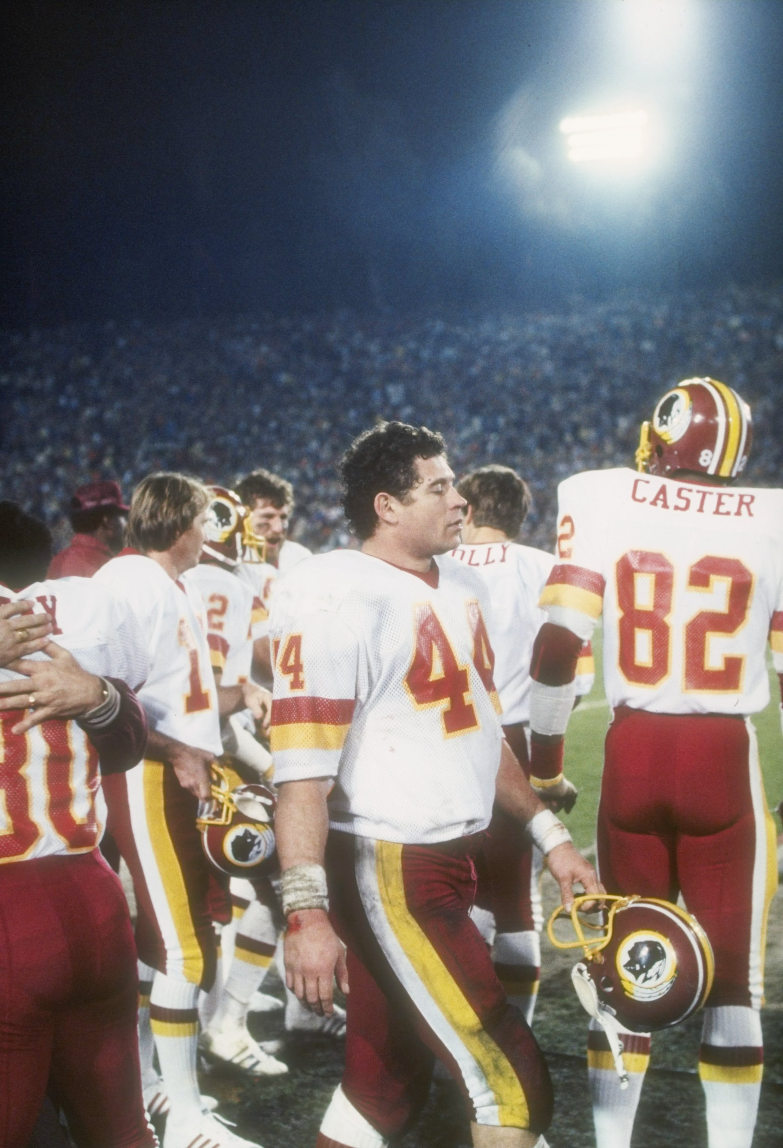 30 Jan 1983:  Running back John Riggins #44 of the Washington Redskins waits on the sidelines during the Super Bowl XVII against the Miami Dolphins at the Rose Bowl in Pasadena, California.  The Redskins won the game, 27-17. Mandatory Credit: Allsport  /A