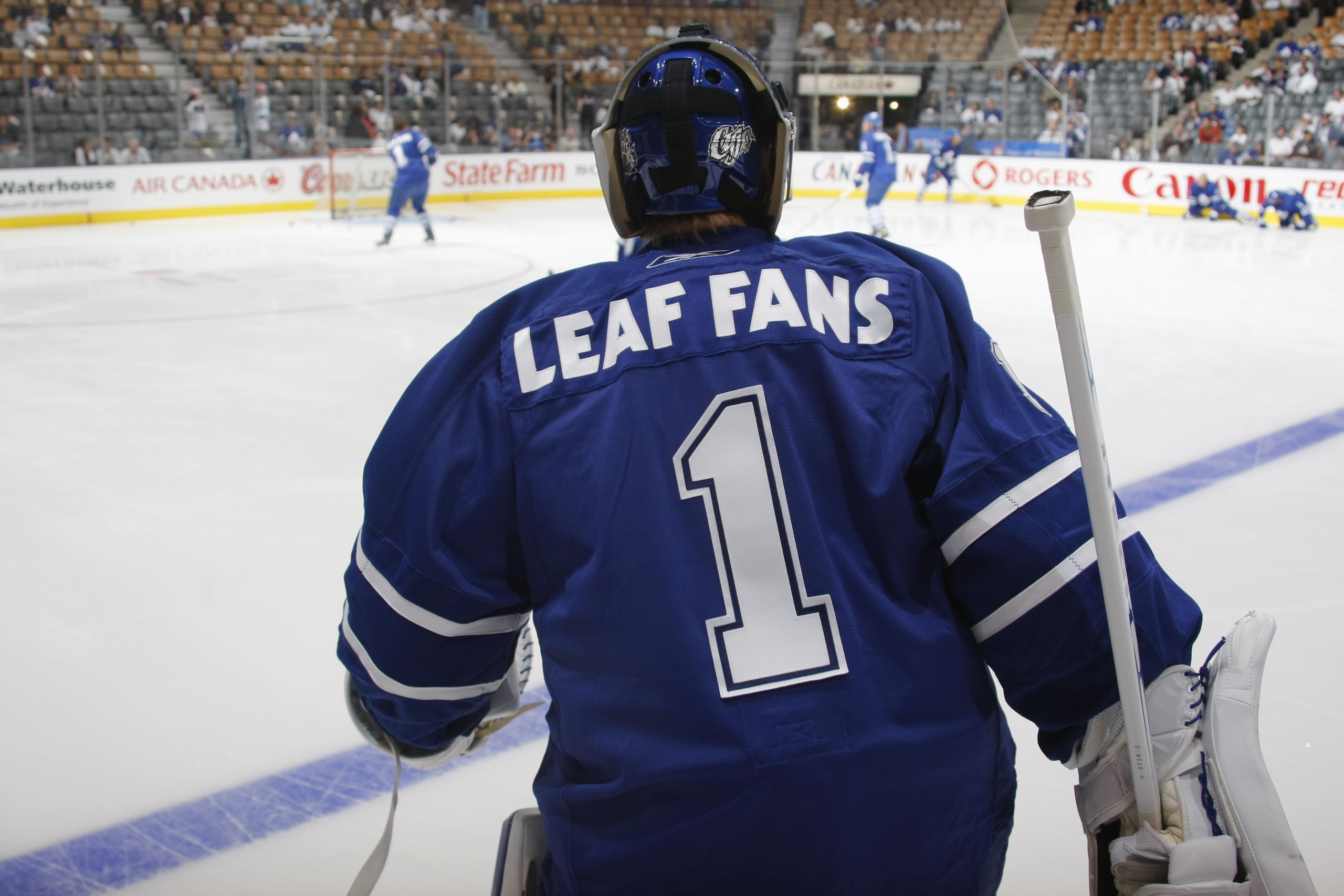 TORONTO - SEPTEMBER 22: Goaltender Curtis Joseph of the Toronto Maple Leafs wears a 'Leaf Fans #1' jersey in warm-ups prior to the start of the NHL game against the Buffalo Sabres at the Air Canada Centre on September 26, 2008 in Toronto, Ontario, Canada TORONTO - SEPTEMBER 22: Goaltender Curtis Joseph of the Toronto Maple Leafs wears a 'Leaf Fans #1' jersey in warm-ups prior to the start of the NHL game against the Buffalo Sabres at the Air Canada Centre on September 26, 2008 in Toronto, Ontario, Canada