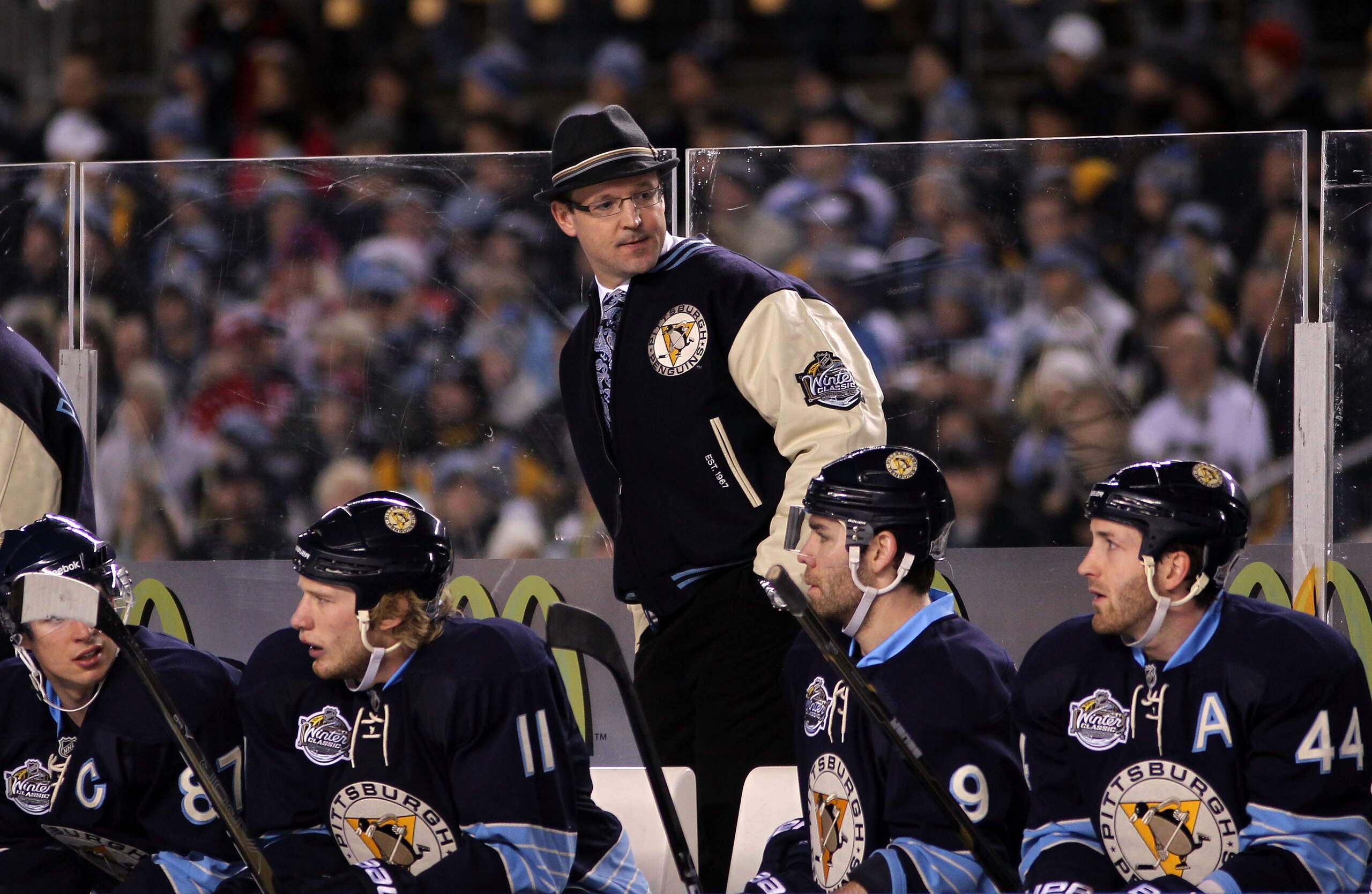 PITTSBURGH, PA - JANUARY 01: Head coach Dan Bylsma talks with players on the bench during the 2011 NHL Bridgestone Winter Classic against the Washington Capitals at Heinz Field on January 1, 2011 in Pittsburgh, Pennsylvania. (Photo by Jamie Squire/Getty PITTSBURGH, PA - JANUARY 01: Head coach Dan Bylsma talks with players on the bench during the 2011 NHL Bridgestone Winter Classic against the Washington Capitals at Heinz Field on January 1, 2011 in Pittsburgh, Pennsylvania. (Photo by Jamie Squire/Getty