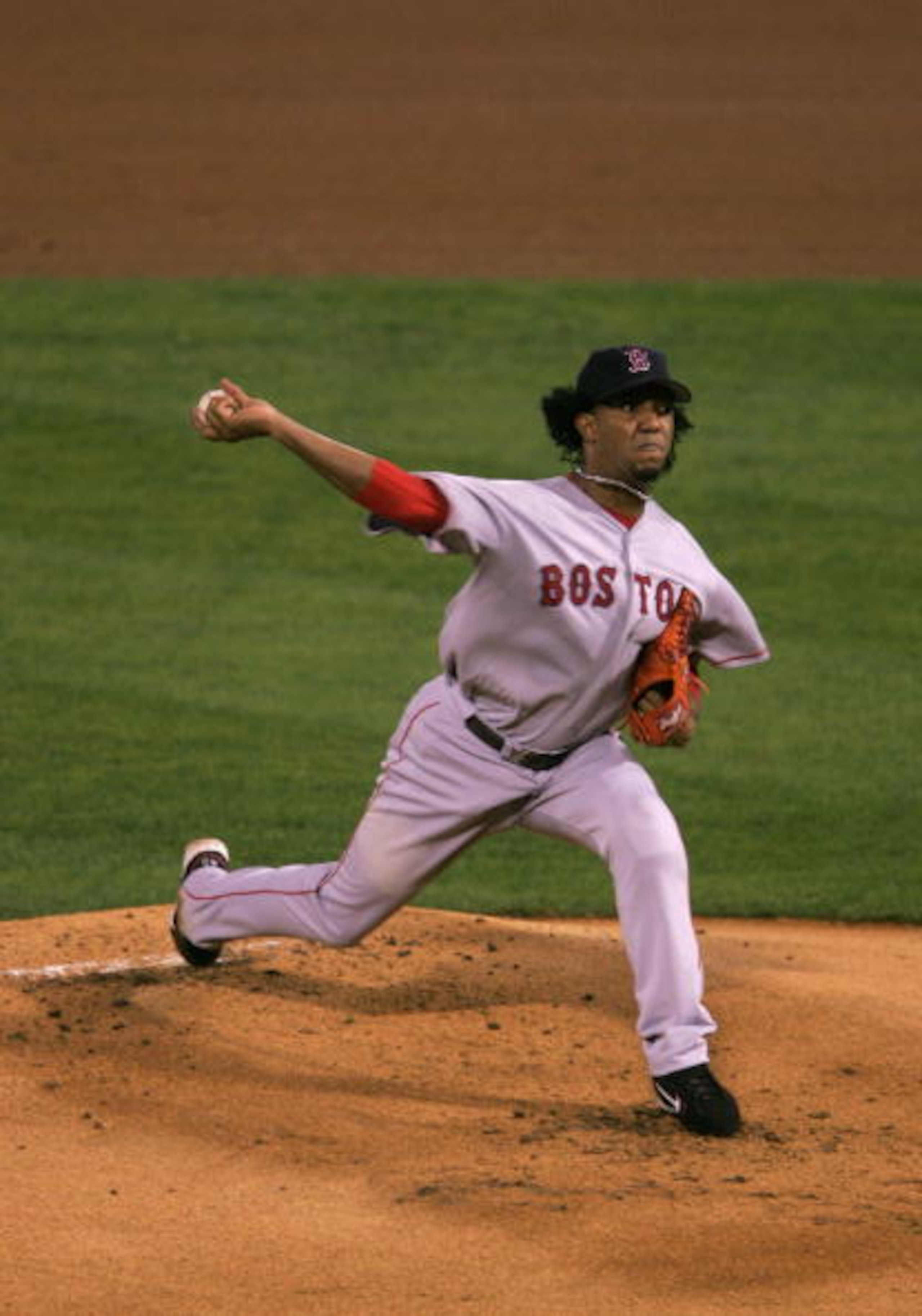 ST LOUIS - OCTOBER 26:  Starting pitcher Pedro Martinez #45 of the Boston Red Sox throws a pitch against the St. Louis Cardinals during the first inning of game three of the World Series on October 26, 2004 at Busch Stadium in St. Louis, Missouri.(Photo b