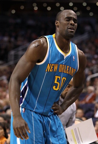 PHOENIX, AZ - JANUARY 30:  Emeka Okafor #50 of the New Orleans Hornets reacts after an injury to his hip during the NBA game against the Phoenix Suns at US Airways Center on January 30, 2011 in Phoenix, Arizona.  NOTE TO USER: User expressly acknowledges