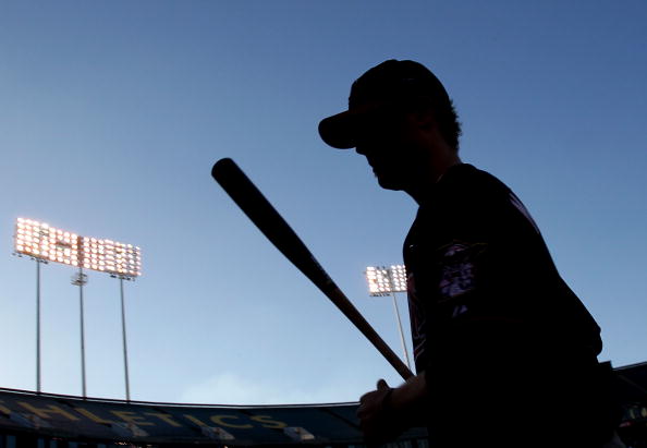 OAKLAND, CA - JUNE 04:  Justin Morneau #33 of the Minnesota Twins looks on against the Oakland Athletics during an MLB game at the Oakland-Alameda County Coliseum on June 4, 2010 in Oakland, California.  (Photo by Jed Jacobsohn/Getty Images)