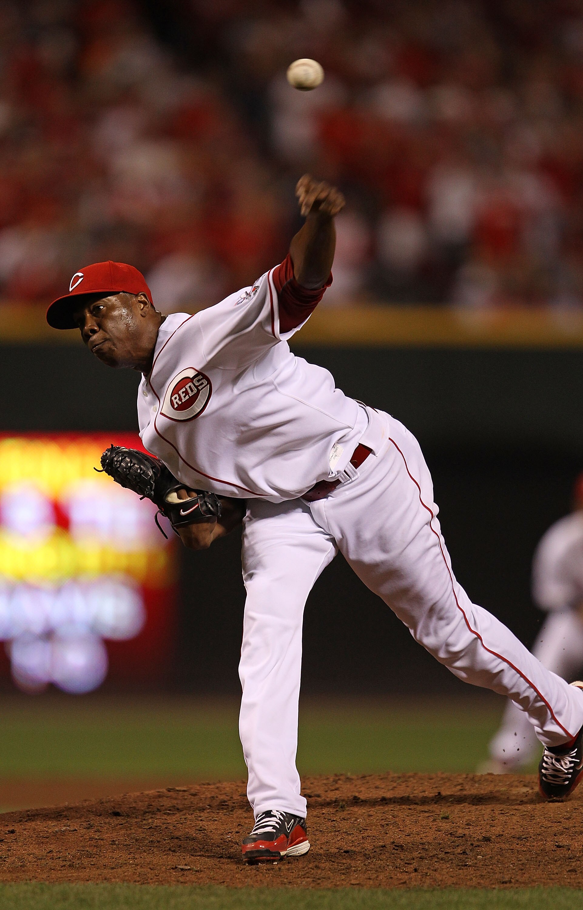 CINCINNATI - OCTOBER 10: Aroldis Chapman #54 of the Cincinnati Reds pitches in the 9th inning against the Philadelphia Phillies during game 3 of the NLDS at Great American Ball Park on October 10, 2010 in Cincinnati, Ohio. The Phillies defeated the Reds 2