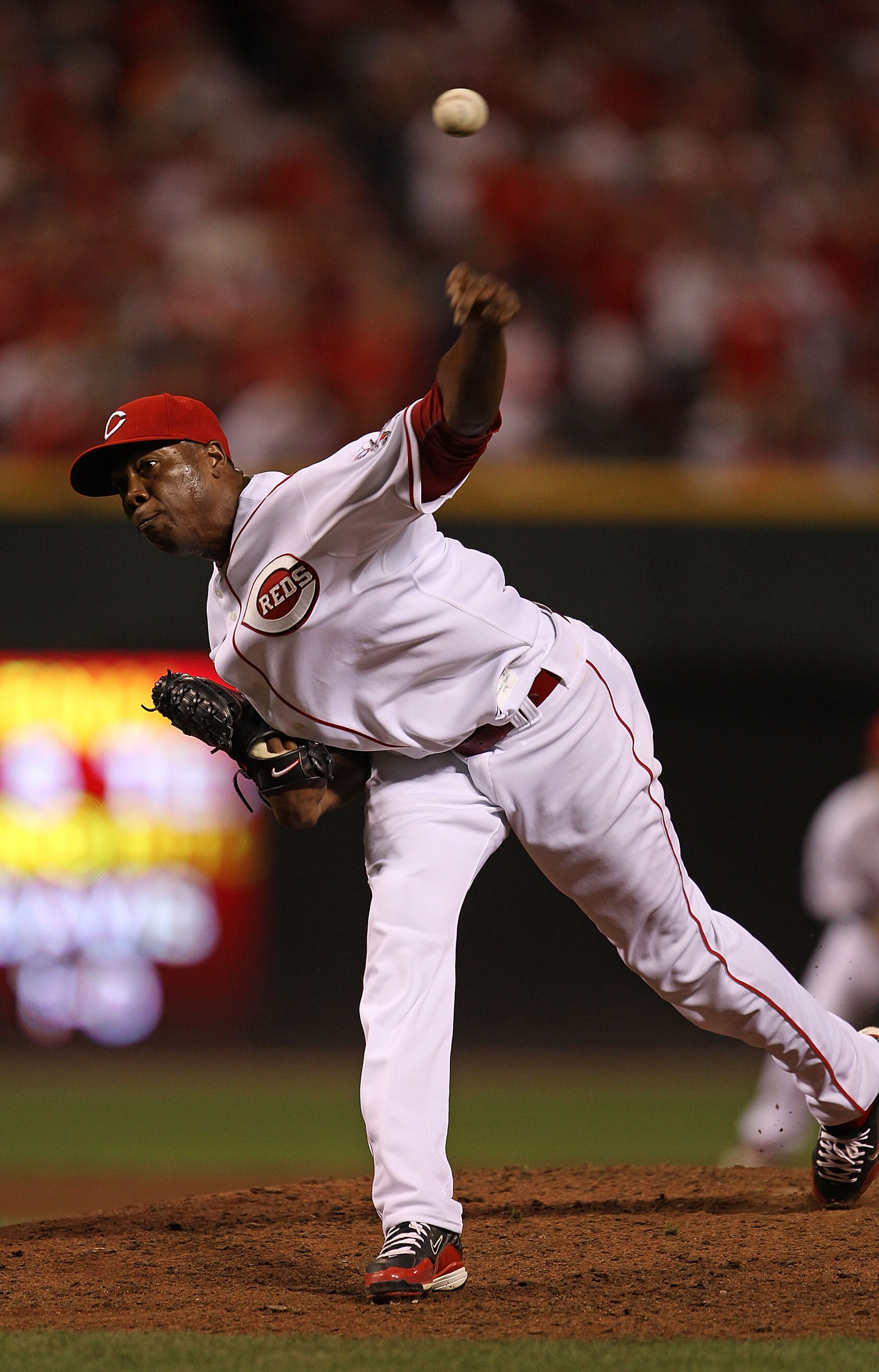CINCINNATI - OCTOBER 10: Aroldis Chapman #54 of the Cincinnati Reds pitches in the 9th inning against the Philadelphia Phillies during game 3 of the NLDS at Great American Ball Park on October 10, 2010 in Cincinnati, Ohio. The Phillies defeated the Reds 2