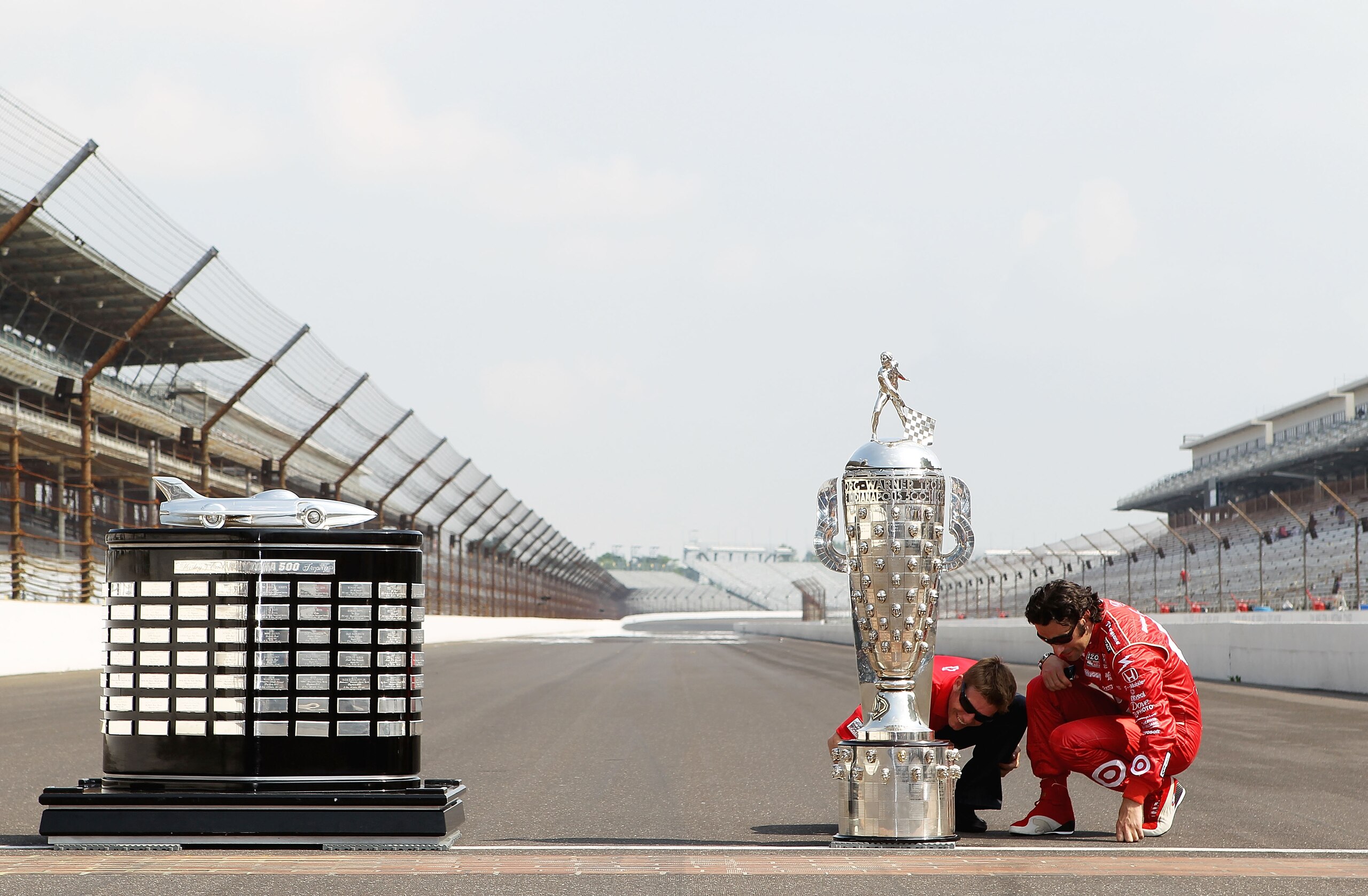 INDIANAPOLIS - MAY 31: (R-L) Dario Franchitti of Scotland, driver of the #10 Target Chip Ganassi Racing Dallara Honda and Chip Ganassi Racing Nascar driver and 2010 Daytona 500 winner Jamie McMurray with the Harley J. Earl trophy and the Borg Warner tro INDIANAPOLIS - MAY 31: (R-L) Dario Franchitti of Scotland, driver of the #10 Target Chip Ganassi Racing Dallara Honda and Chip Ganassi Racing Nascar driver and 2010 Daytona 500 winner Jamie McMurray with the Harley J. Earl trophy and the Borg Warner tro