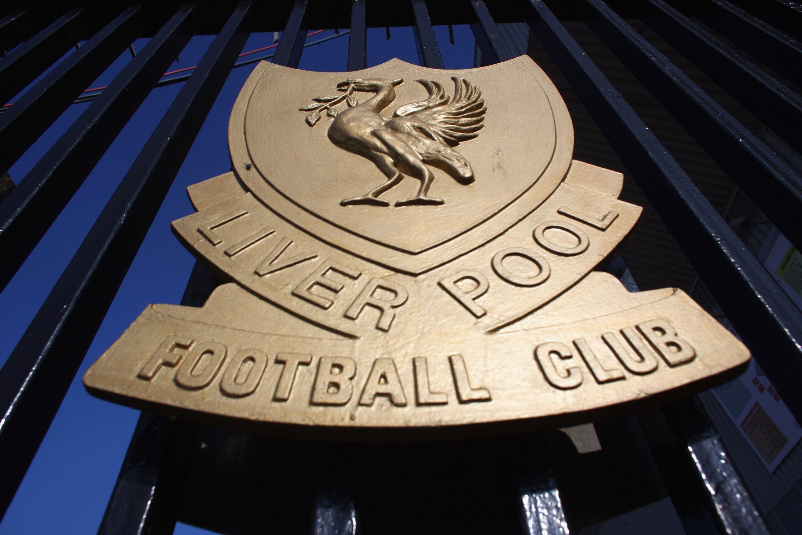LIVERPOOL, ENGLAND - OCTOBER 12:  The Liverpool Football Club emblem, the Liver Bird, adorns the  gates of Anfield on October 12, 2010 in Liverpool, England. The Royal Bank of Scotland, which holds the majority of Liverpool's debts, is seeking a high cour