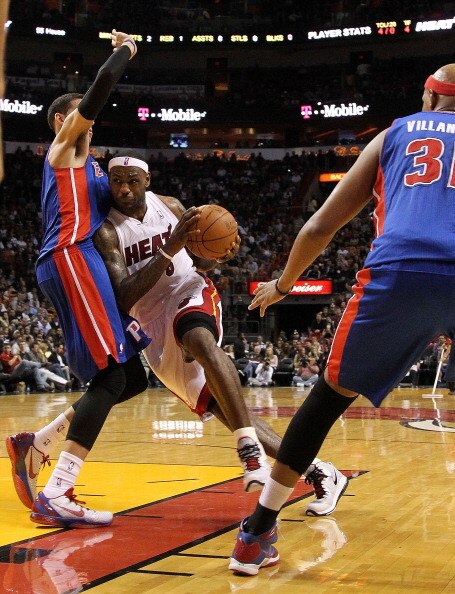 MIAMI, FL - JANUARY 28:  LeBron James #6 of the Miami Heat drives against Austin Daye #5 of the Detroit Pistons during a game at American Airlines Arena on January 28, 2011 in Miami, Florida. NOTE TO USER: User expressly acknowledges and agrees that, by d