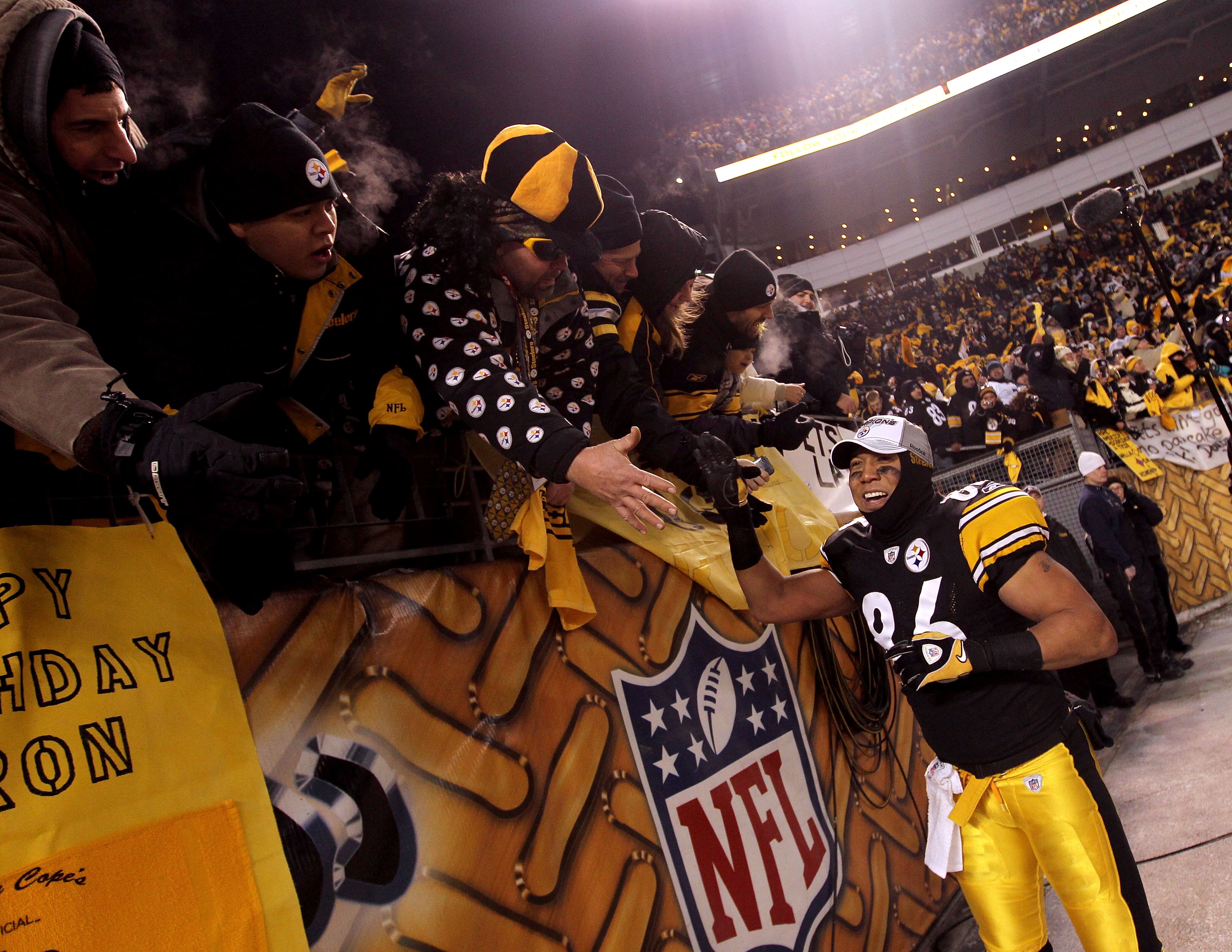 PITTSBURGH, PA - JANUARY 23: Hines Ward #86 of the Pittsburgh Steelers celebrates with fans after their 24 to 19 win over the New York Jets in the 2011 AFC Championship game at Heinz Field on January 23, 2011 in Pittsburgh, Pennsylvania. (Photo by Nick PITTSBURGH, PA - JANUARY 23: Hines Ward #86 of the Pittsburgh Steelers celebrates with fans after their 24 to 19 win over the New York Jets in the 2011 AFC Championship game at Heinz Field on January 23, 2011 in Pittsburgh, Pennsylvania. (Photo by Nick