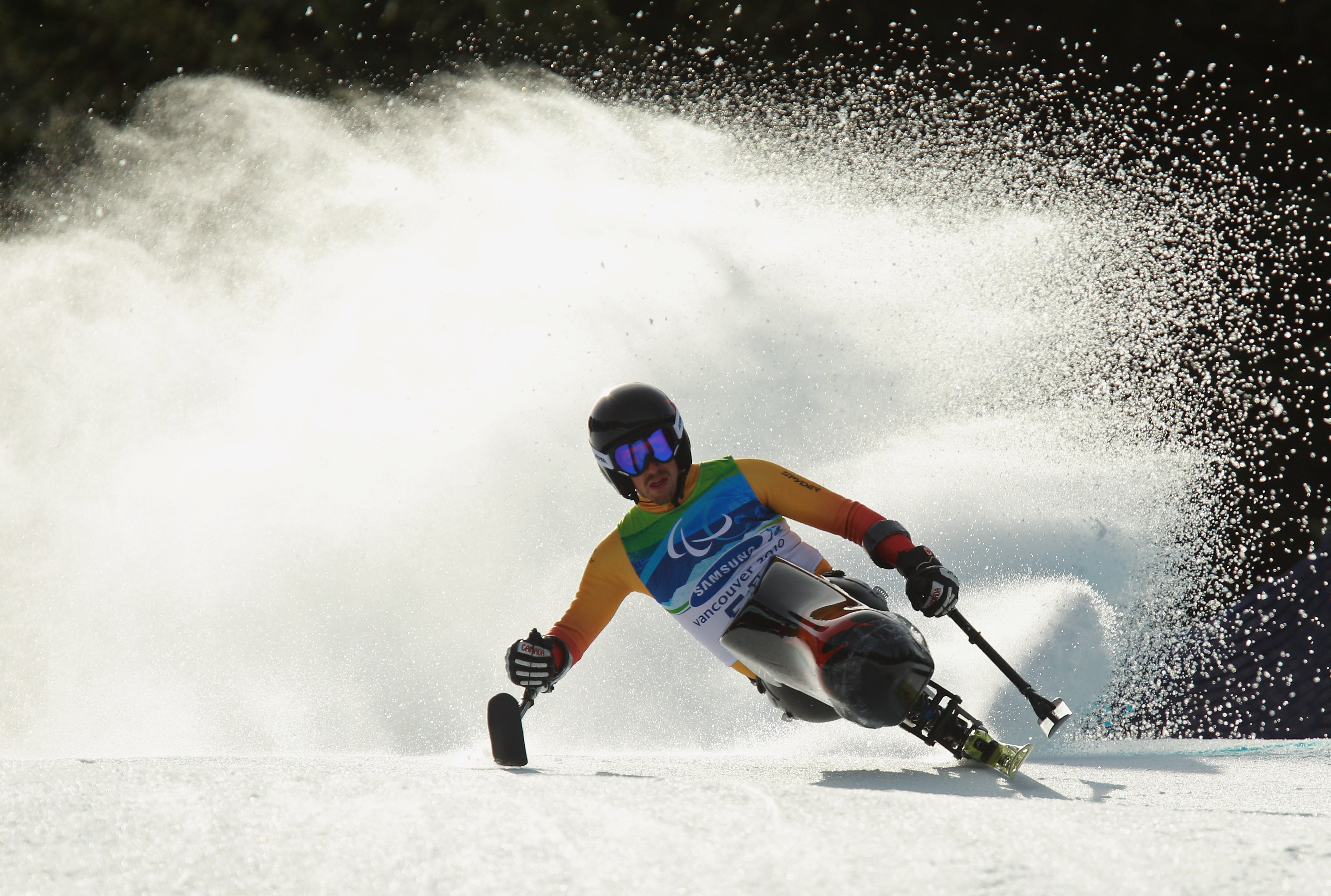 WHISTLER, BC - MARCH 19:  Josh Dueck of Canada competes in the Men's Sitting Super-G during Day 8 of the 2010 Vancouver Winter Paralympics at Whistler Creekside on March 19, 2010 in Whistler, Canada.  (Photo by Quinn Rooney/Getty Images)