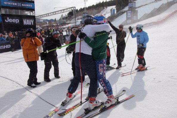 ASPEN, CO - JANUARY 30:  John Teller (white) of Mammoth Lakes, California is congratulated bby third place finisher Casey Puckett (green) of Aspen, Colorado in the Men's Skier X at Winter X Games 15 at Buttermilk Mountain on January 30, 2011 in Aspen, Col