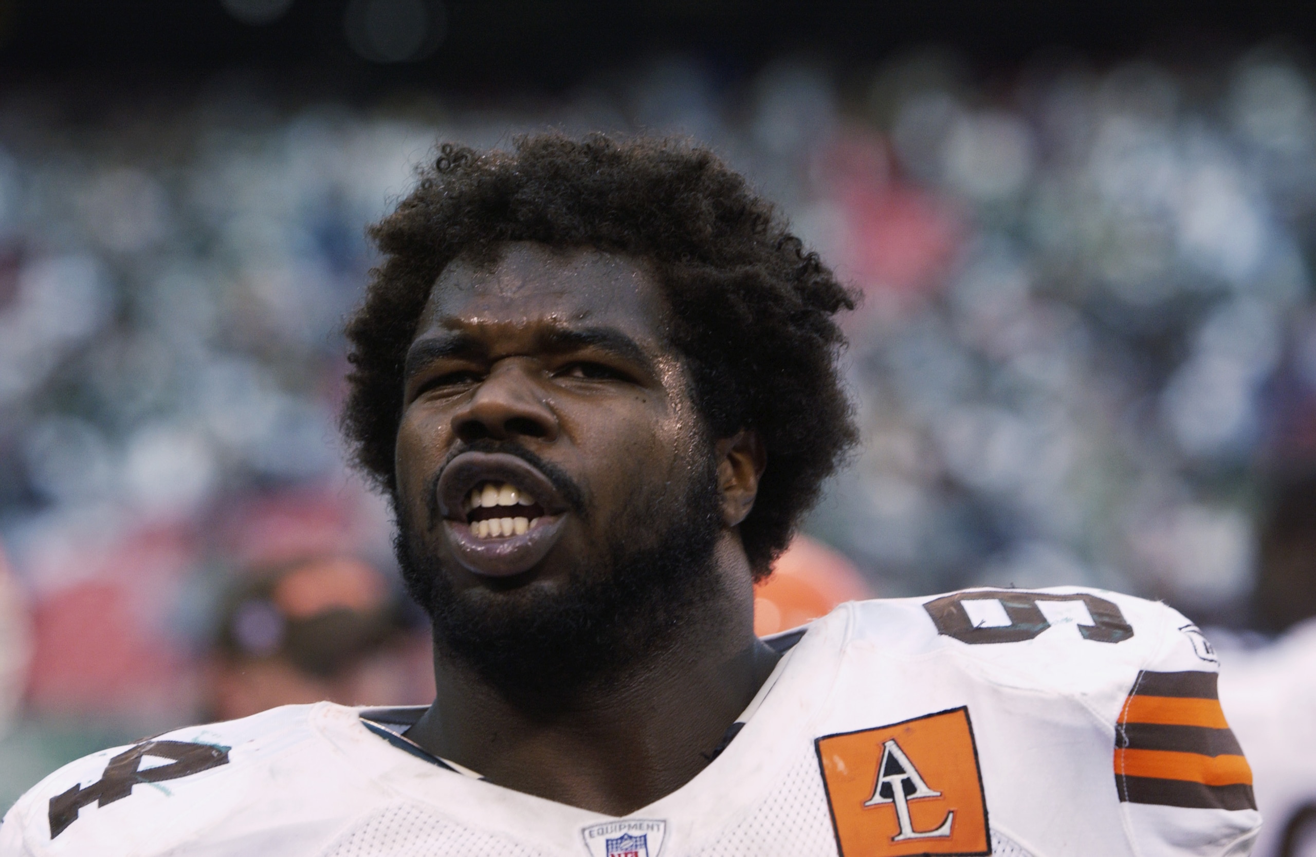 EAST RUTHERFORD, NJ - OCTOBER 27:  Defensive Tackle Gerard Warren #94 of the Cleveland Browns looks on during the NFL game against the New York Jets at Giant Stadium on October 27, 2002 in East Rutherford, New Jersey.  The Browns defeated the Jets 24-21.