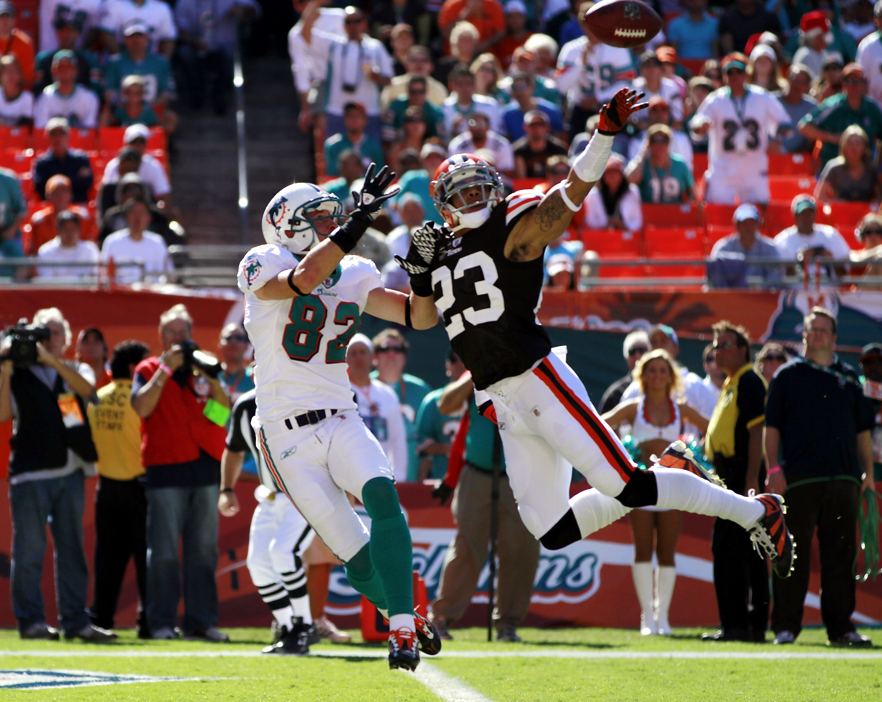 MIAMI - DECEMBER 05:  Defensive back Joe Haden #23 of the Cleveland Browns defends against wide reciever Brian Hartline #82 of the Miami Dolphins at Sun Life Stadium on December 5, 2010 in Miami, Florida.  (Photo by Marc Serota/Getty Images)