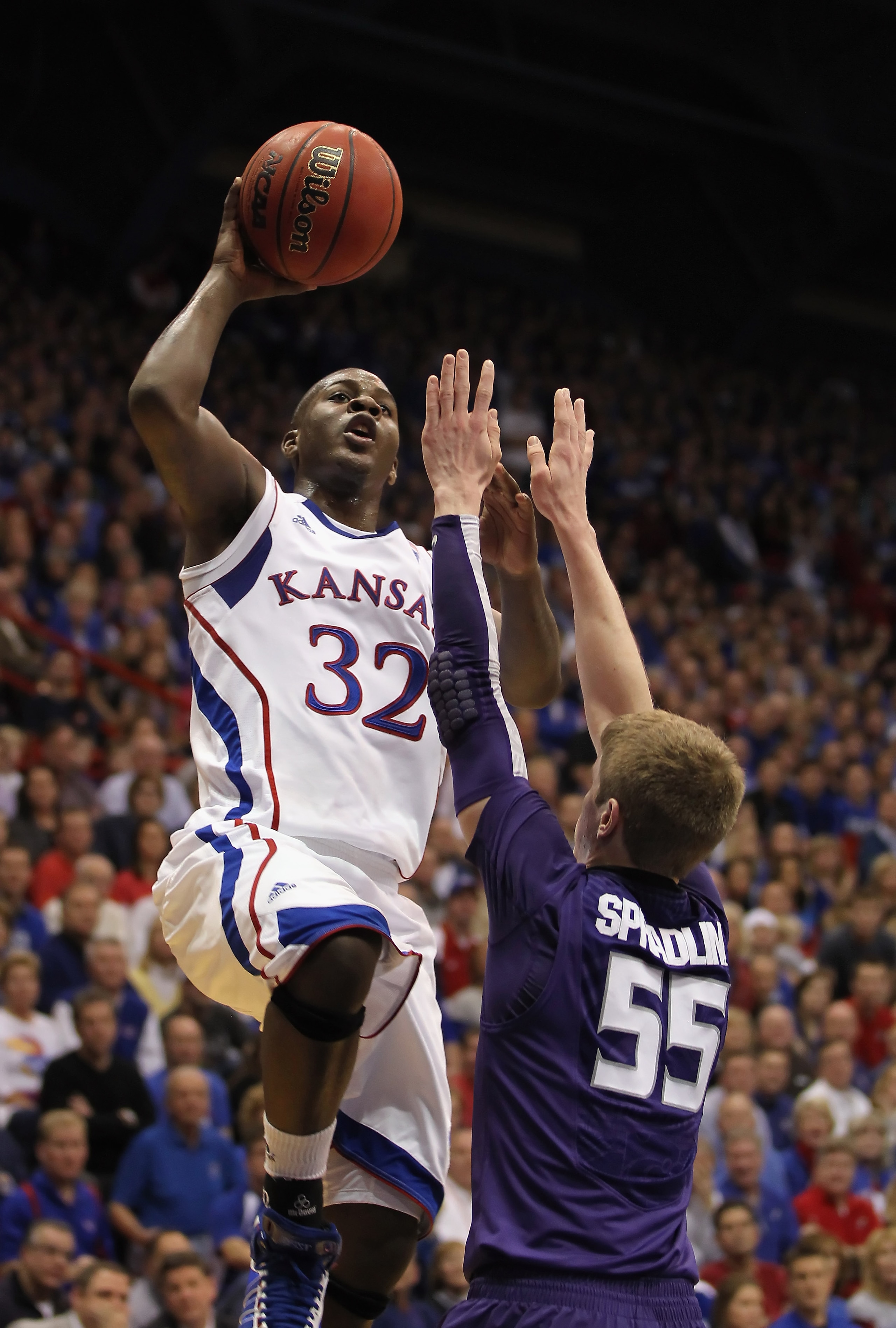 LAWRENCE, KS - JANUARY 29: Josh Selby #32 of the Kansas Jayhawks shoots over Will Spradling #55 of the Kansas State Wildcats for a rebound during the game on January 29, 2011 at Allen Fieldhouse in Lawrence, Kansas. (Photo by Jamie Squire/Getty Images) LAWRENCE, KS - JANUARY 29: Josh Selby #32 of the Kansas Jayhawks shoots over Will Spradling #55 of the Kansas State Wildcats for a rebound during the game on January 29, 2011 at Allen Fieldhouse in Lawrence, Kansas. (Photo by Jamie Squire/Getty Images)