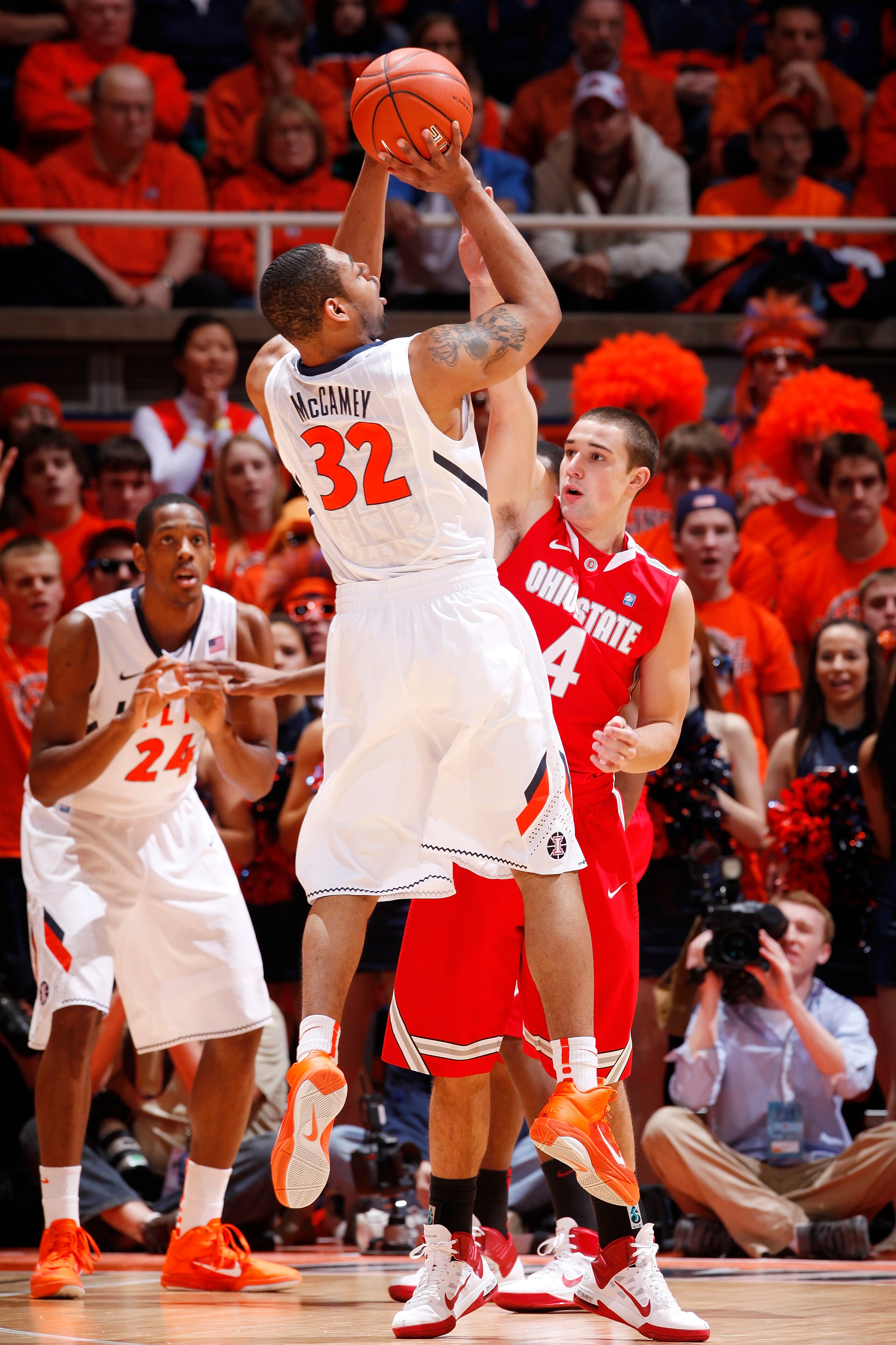CHAMPAIGN, IL - JANUARY 22: Demetri McCamey #32 of the Illinois Fighting Illini takes a shot while being defended by Aaron Craft #4 of the Ohio State Buckeyes at Assembly Hall on January 22, 2011 in Champaign, Illinois. Ohio State won 73-68. (Photo by Joe CHAMPAIGN, IL - JANUARY 22: Demetri McCamey #32 of the Illinois Fighting Illini takes a shot while being defended by Aaron Craft #4 of the Ohio State Buckeyes at Assembly Hall on January 22, 2011 in Champaign, Illinois. Ohio State won 73-68. (Photo by Joe