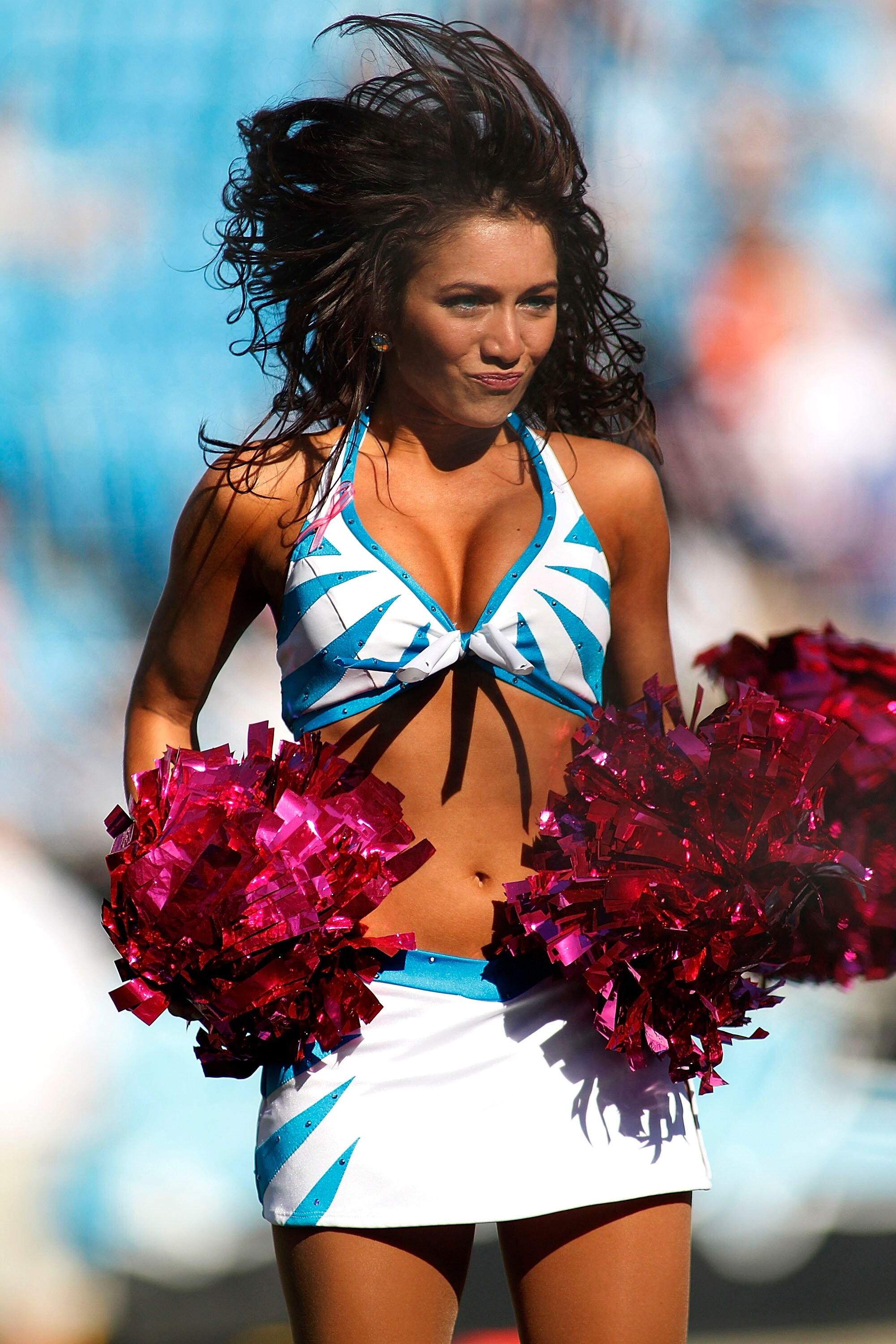 CHARLOTTE, NC - OCTOBER 10: A Carolina Panthers cheerleader dances against the Chicago Bears at Bank of America Stadium on October 10, 2010 in Charlotte, North Carolina.  (Photo by Geoff Burke/Getty Images)