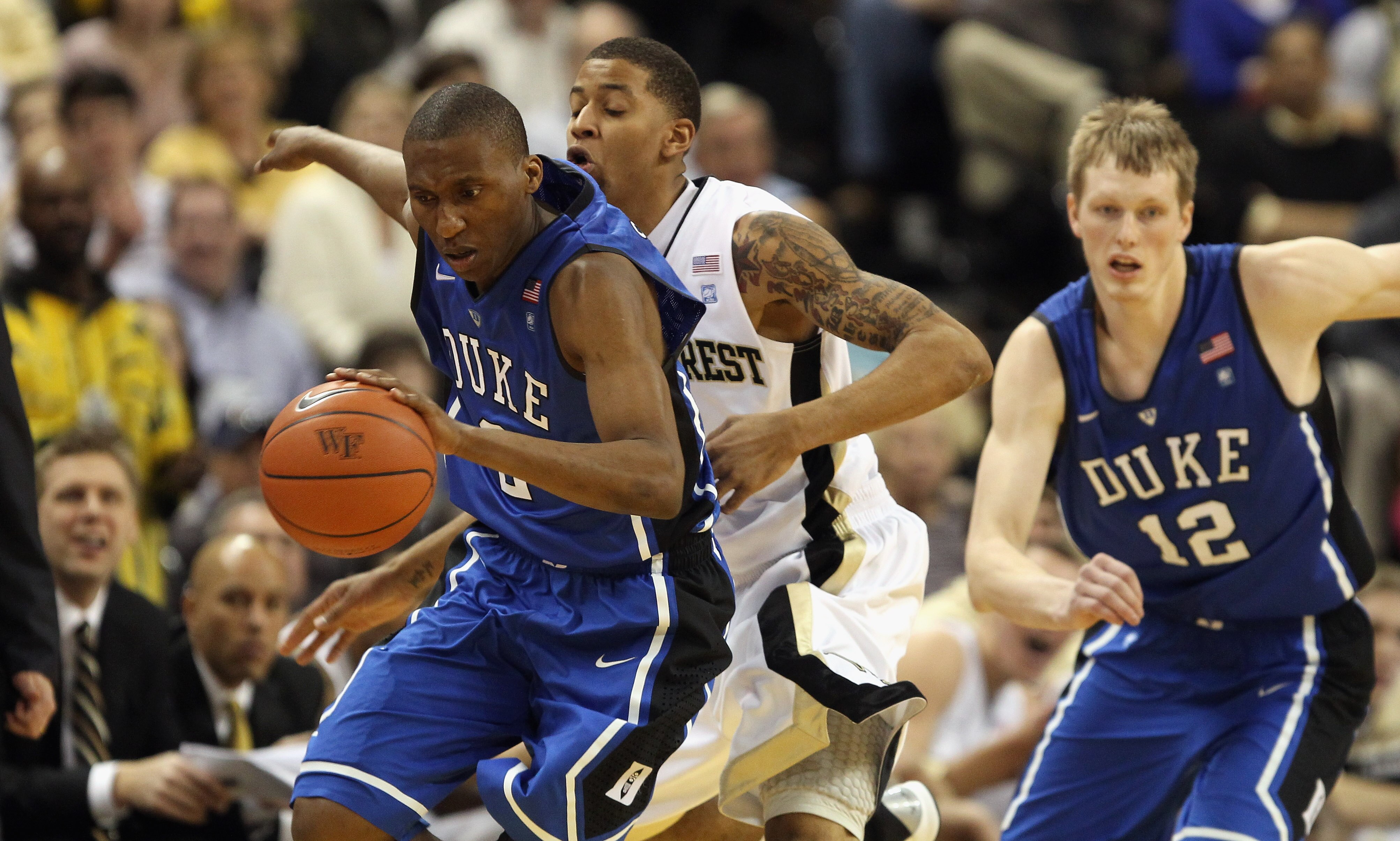 WINSTON SALEM, NC - JANUARY 22:  Nolan Smith #2 of the Duke Blue Devils drives to the basket against J.T. Terrell  #0 of the Wake Forest Demon Deacons during their game at Lawrence Joel Coliseum on January 22, 2011 in Winston Salem, North Carolina.  (Phot
