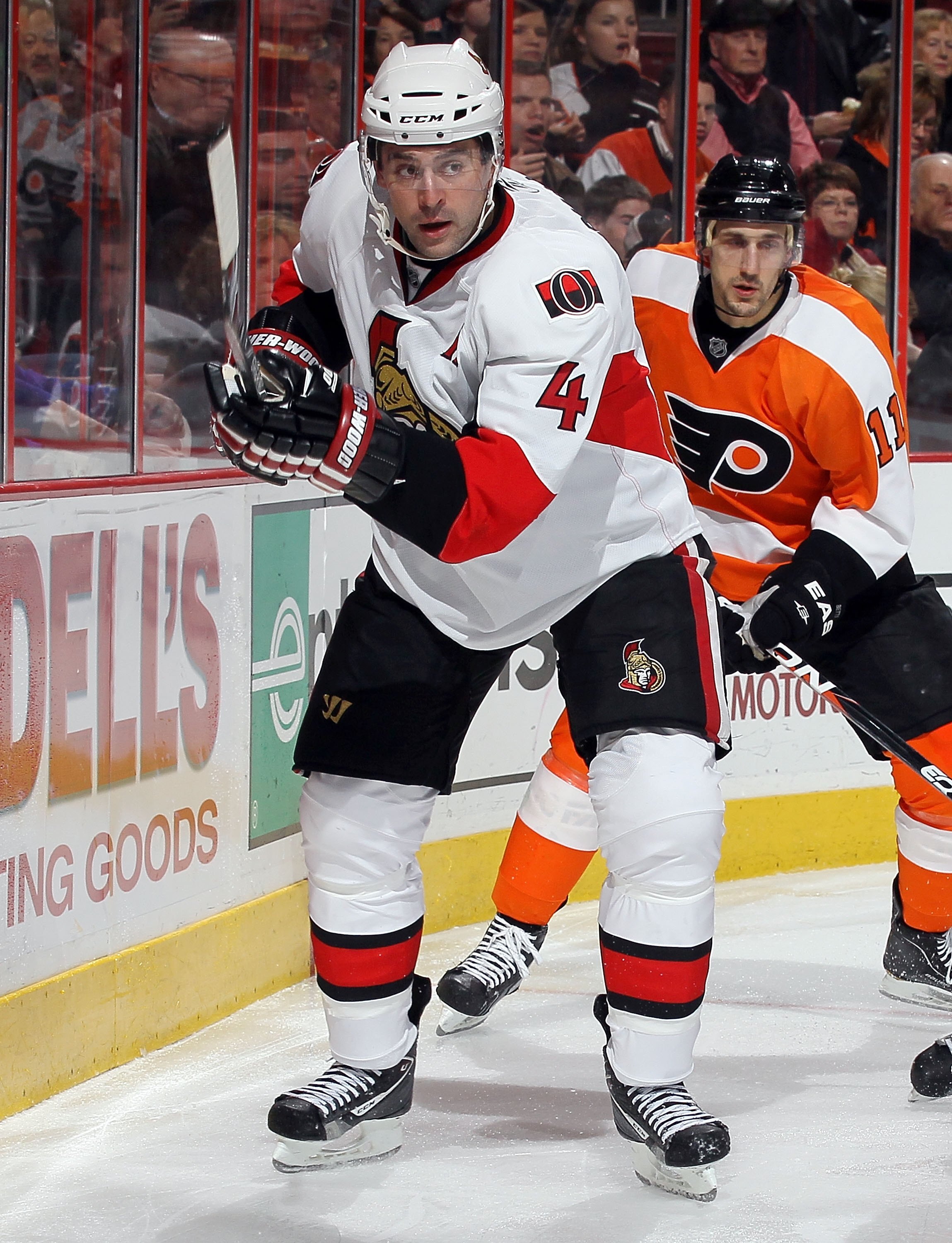 PHILADELPHIA, PA - JANUARY 20:  Chris Phillips #4 of the Ottawa Senators skates against the Philadelphia Flyers on January 20, 2011 at Wells Fargo Center in Philadelphia, Pennsylvania.  (Photo by Jim McIsaac/Getty Images)