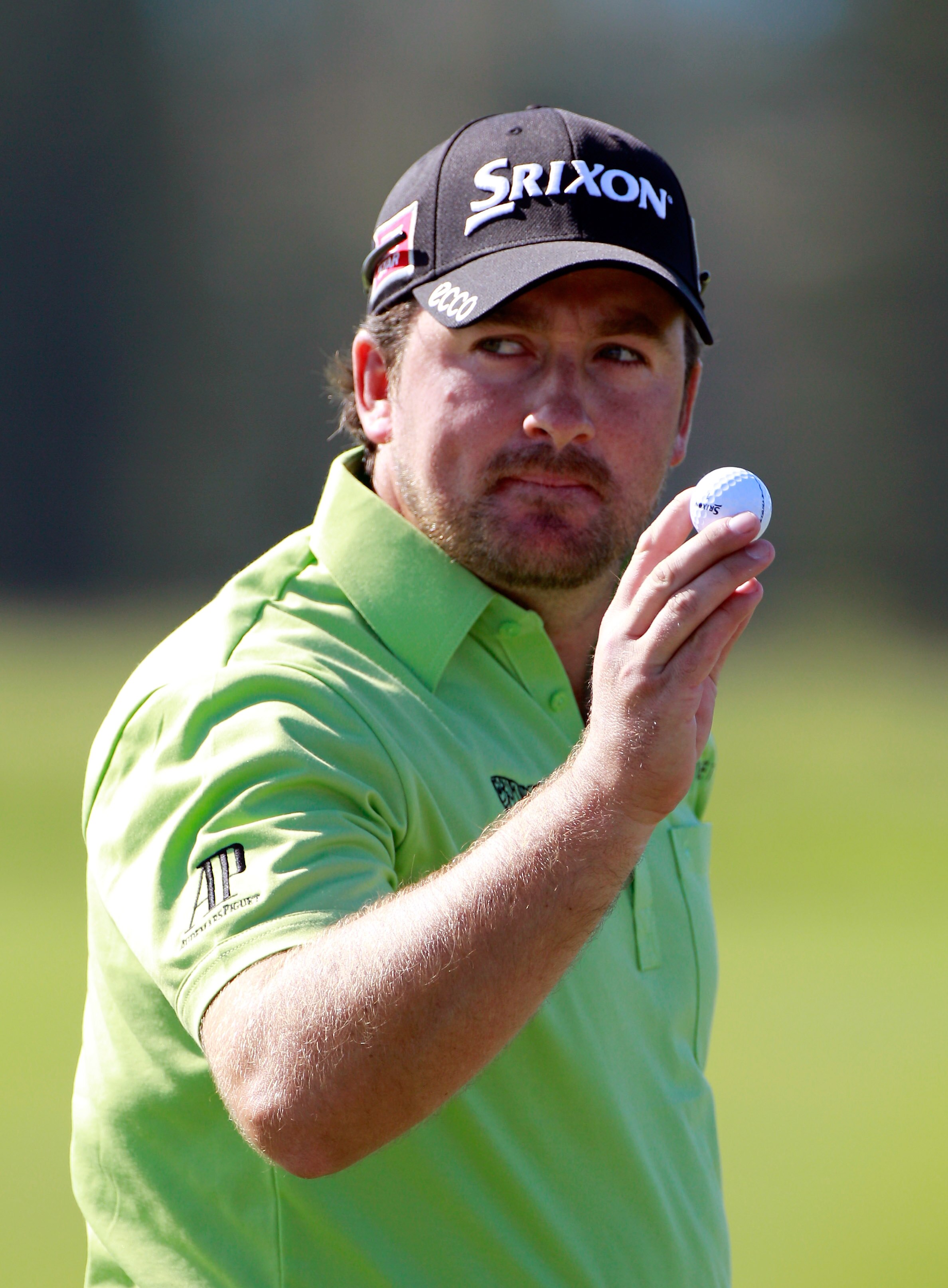 KAPALUA, HI - JANUARY 09:  Graeme McDowell of Northern Ireland reacts to a birdie on the 14th hole during the final round of the Hyundai Tournament of Champions at the Plantation course on January 9, 2011 in Kapalua, Hawaii.  (Photo by Sam Greenwood/Getty